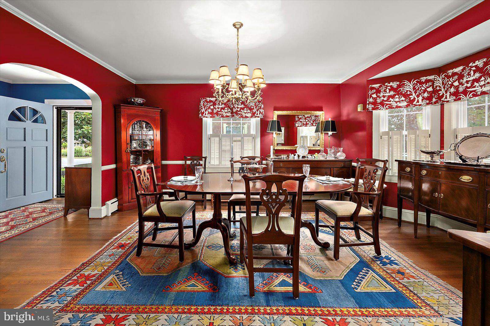 921 Riverside Drive Salisbury, MD 21801 - Photo 14 of 62 a view of a dining room with furniture a chandelier and wooden floor