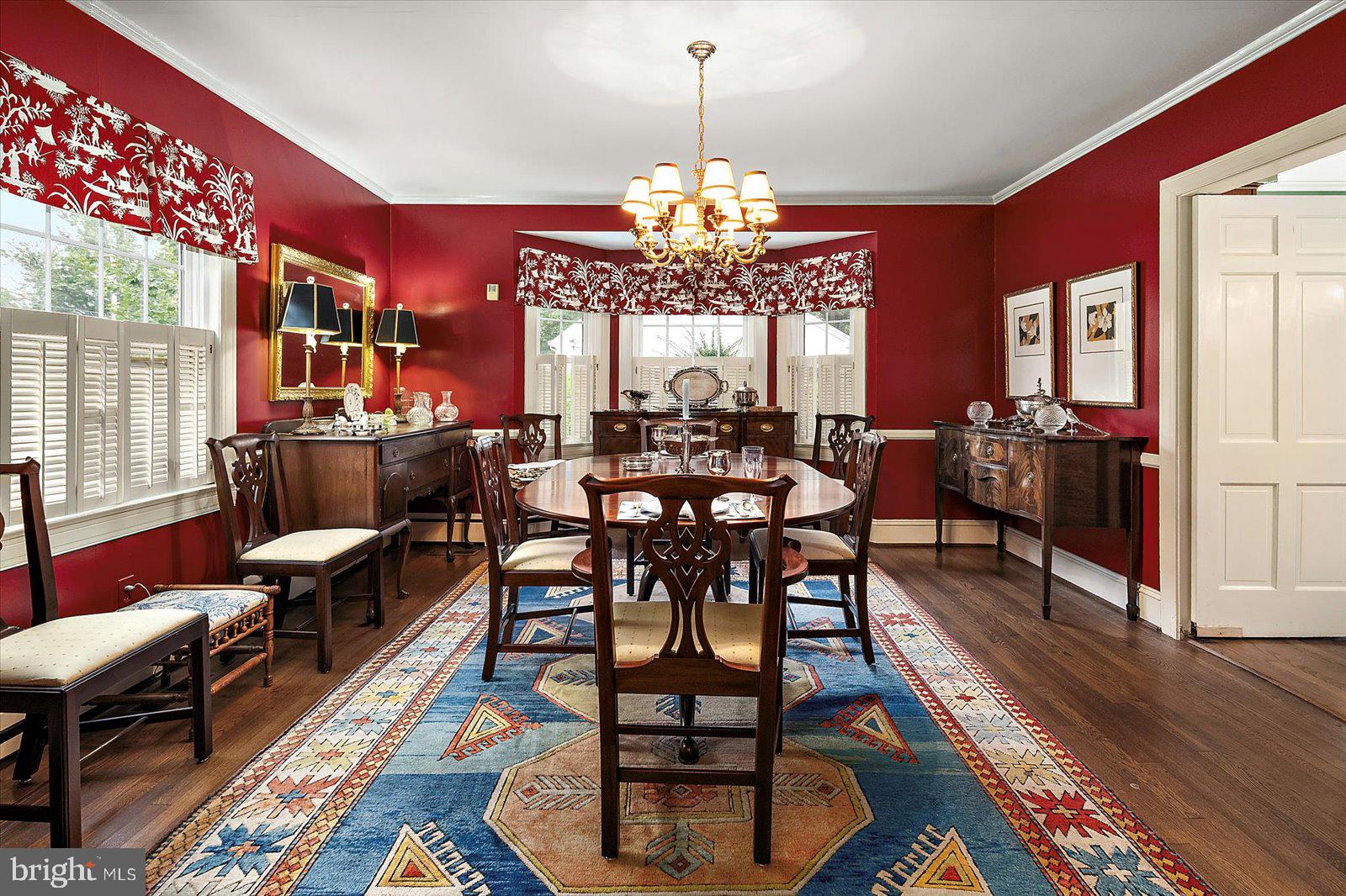 921 Riverside Drive Salisbury, MD 21801 - Photo 15 of 62 a view of a dining room with furniture and chandelier