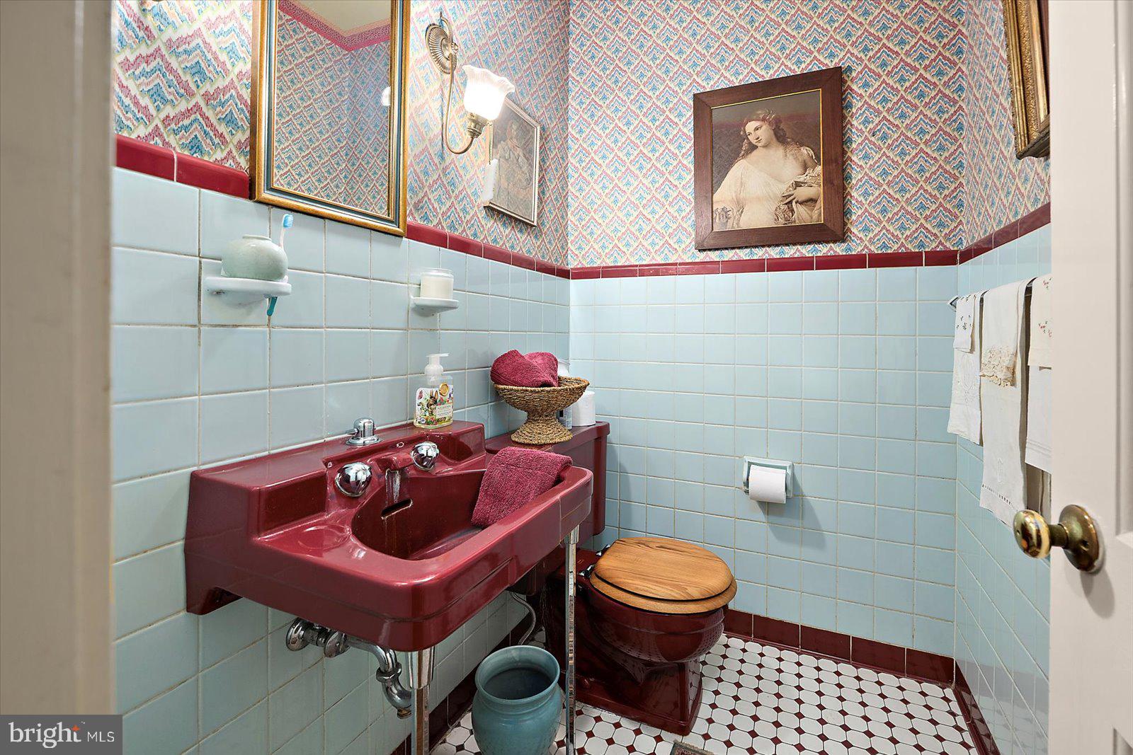 921 Riverside Drive Salisbury, MD 21801 - Photo 25 of 62 a bathroom with a toilet and a sink