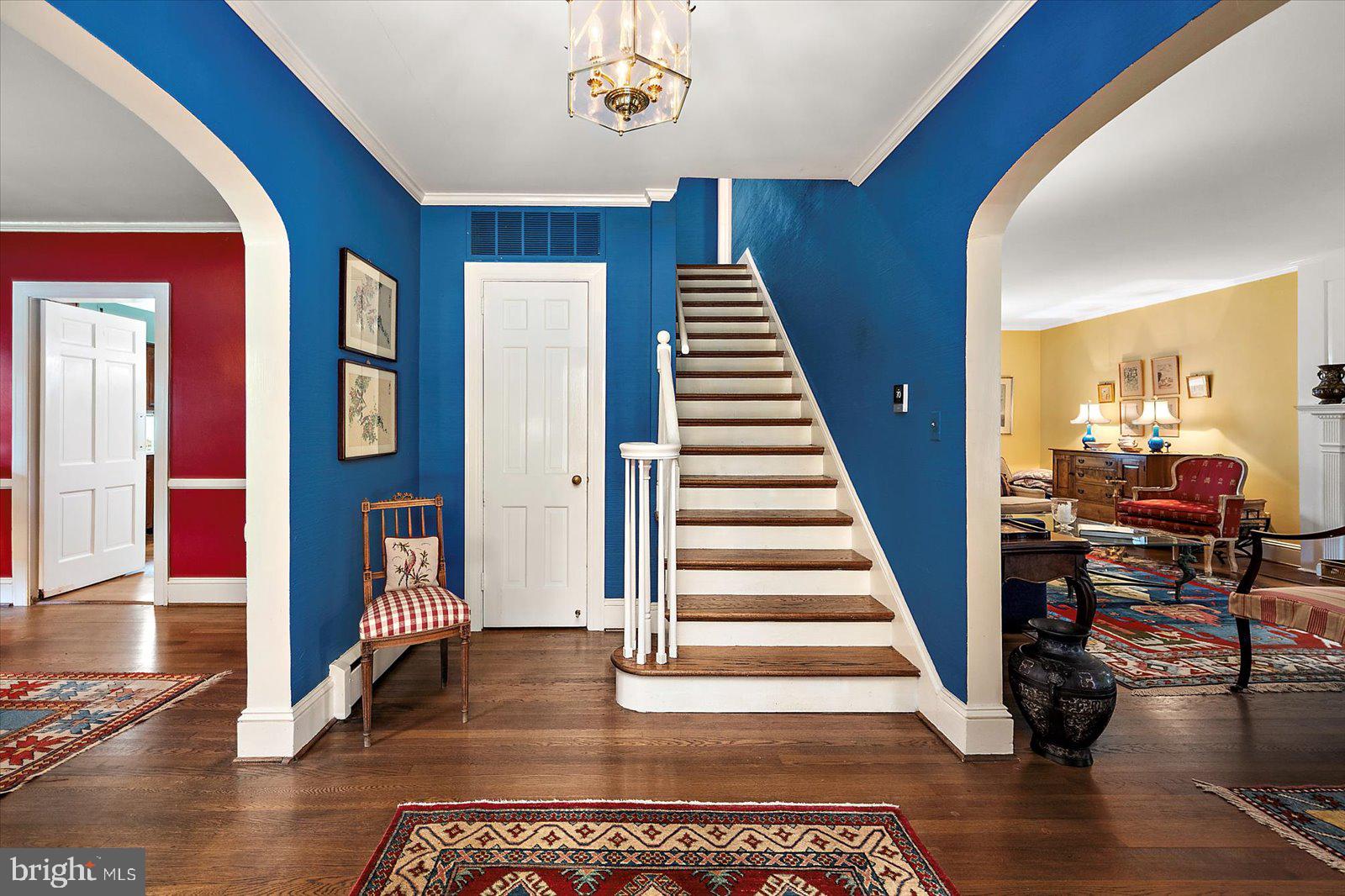 921 Riverside Drive Salisbury, MD 21801 - Photo 26 of 62 a view of an entryway with wooden floor and a chandelier
