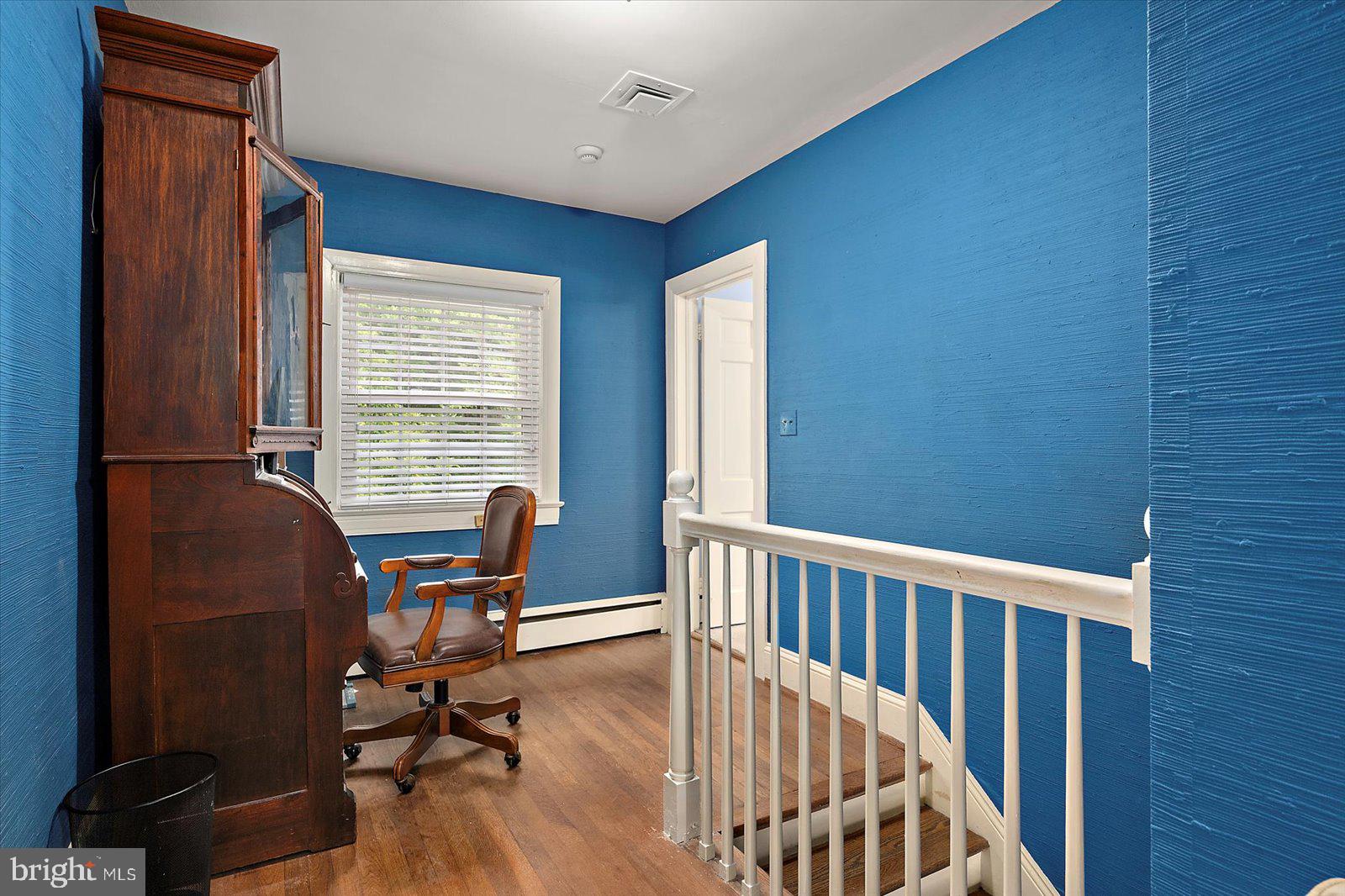 921 Riverside Drive Salisbury, MD 21801 - Photo 27 of 62 a view of a workspace with furniture and a window