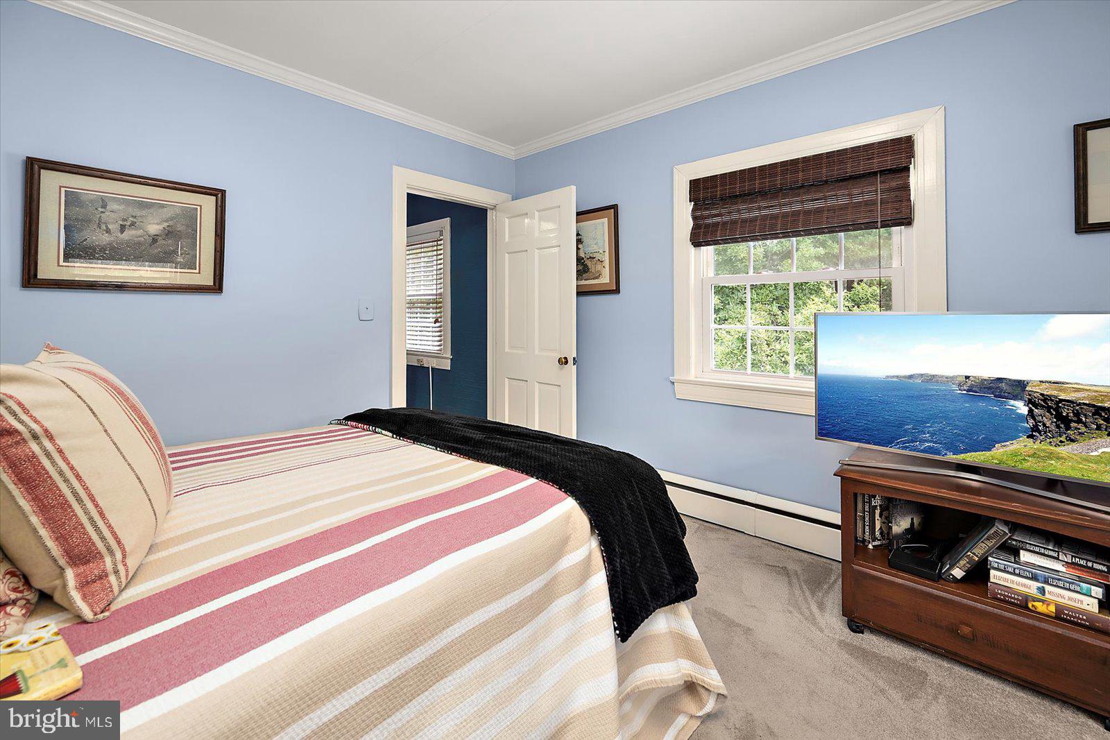 921 Riverside Drive Salisbury, MD 21801 - Photo 29 of 62 a bedroom with a bed and a window