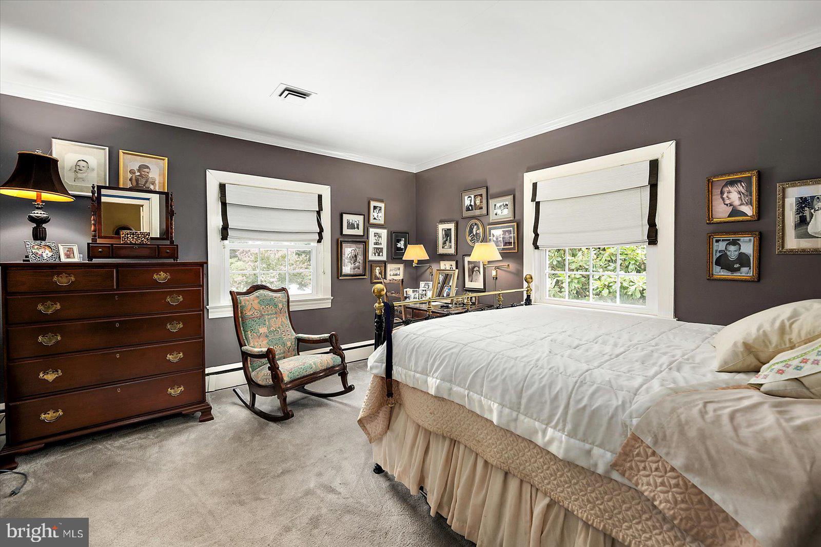 921 Riverside Drive Salisbury, MD 21801 - Photo 41 of 62 a bedroom with a bed mirror and window