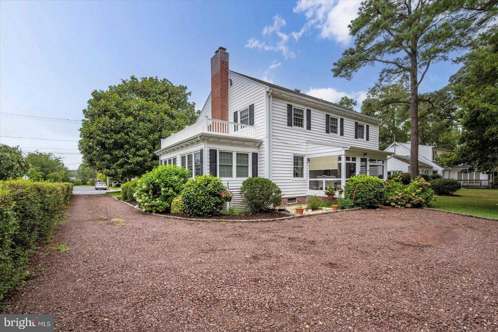 921 Riverside Drive Salisbury, MD 21801 - Photo 54 of 62 a front view of a house with a garden