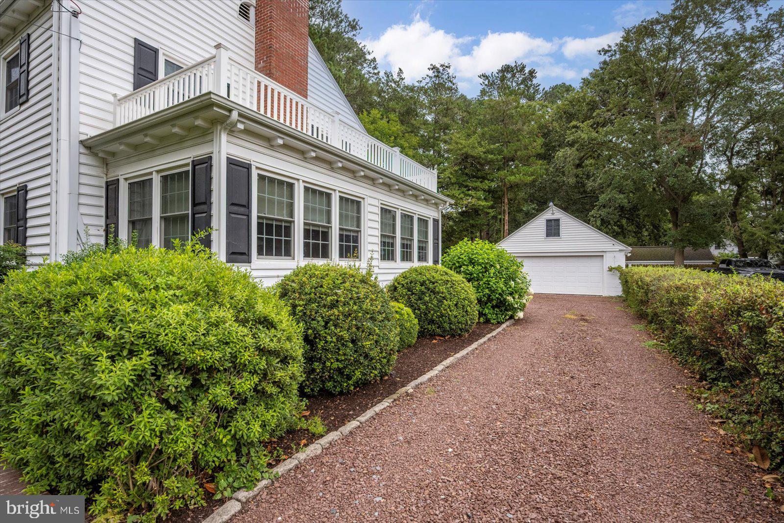 921 Riverside Drive Salisbury, MD 21801 - Photo 56 of 62 a view of a house with a yard and potted plants