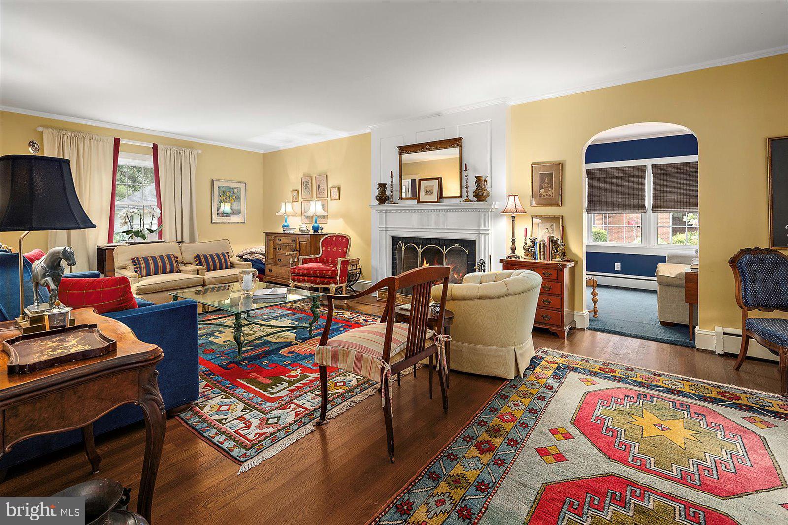 921 Riverside Drive Salisbury, MD 21801 - Photo 10 of 62 a living room with furniture a rug and a fireplace