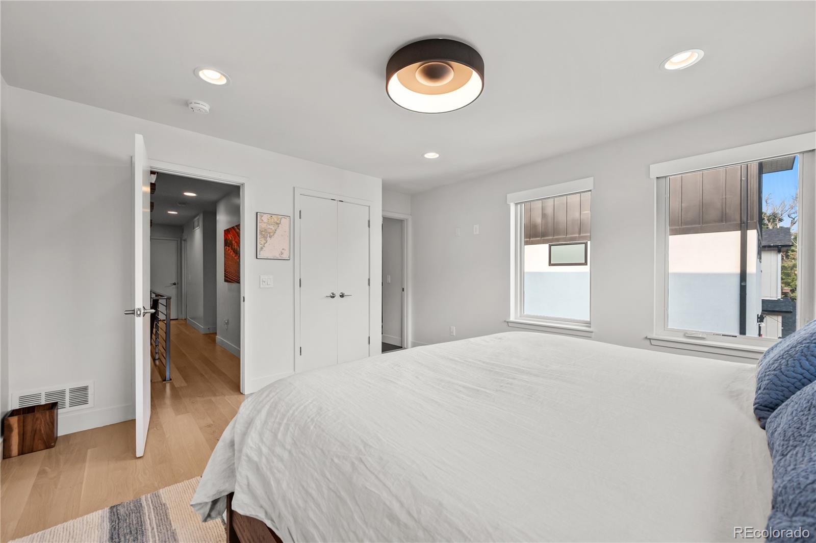 3448 West 36th Avenue Denver, CO 80211 - Photo 21 of 48 a bedroom with a bed and a window