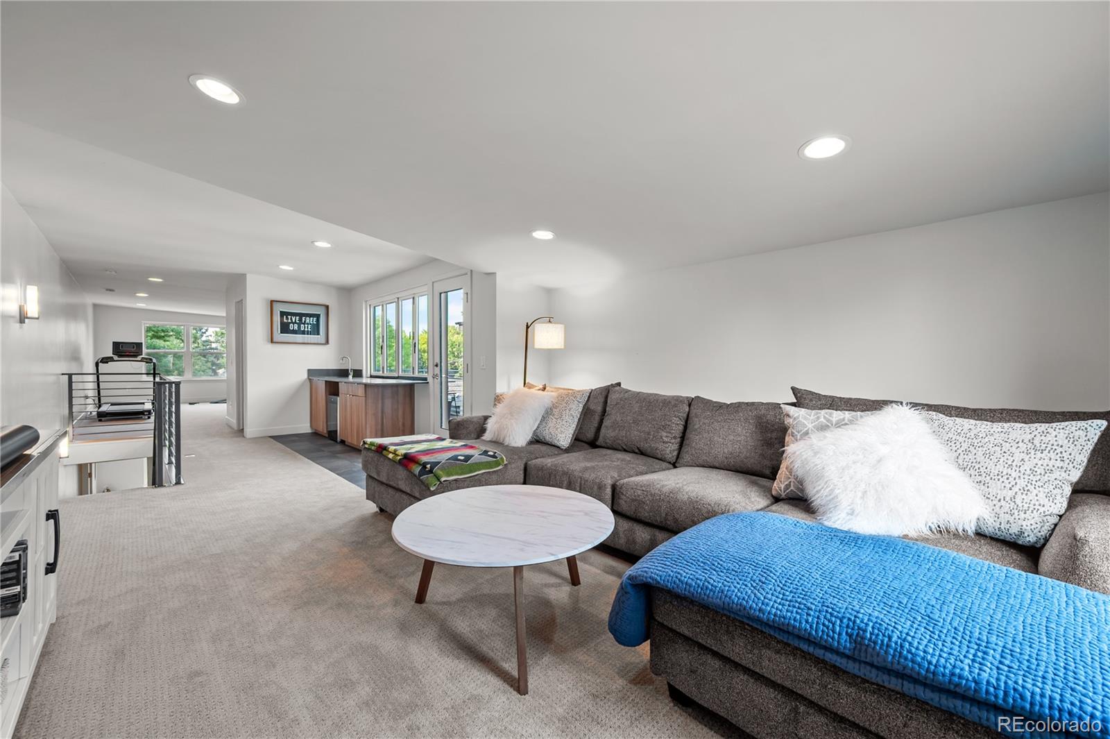 3448 West 36th Avenue Denver, CO 80211 - Photo 30 of 48 a living room with furniture and a couch