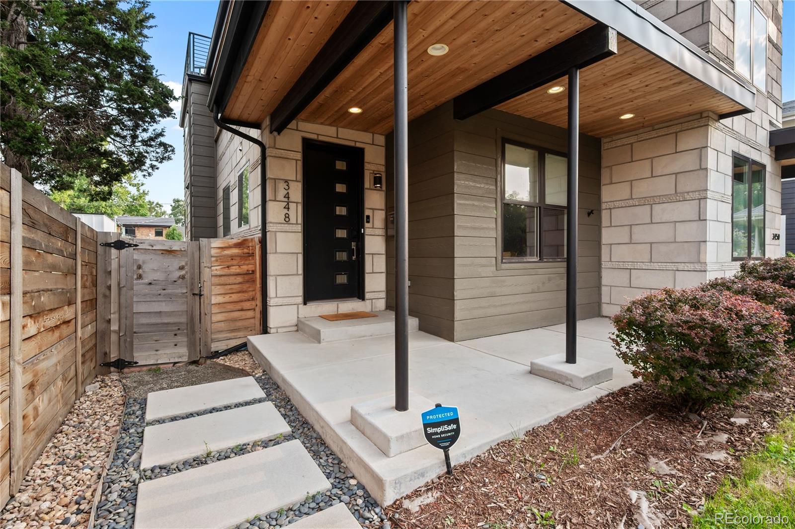 3448 West 36th Avenue Denver, CO 80211 - Photo 3 of 48 a view of a porch with seating space