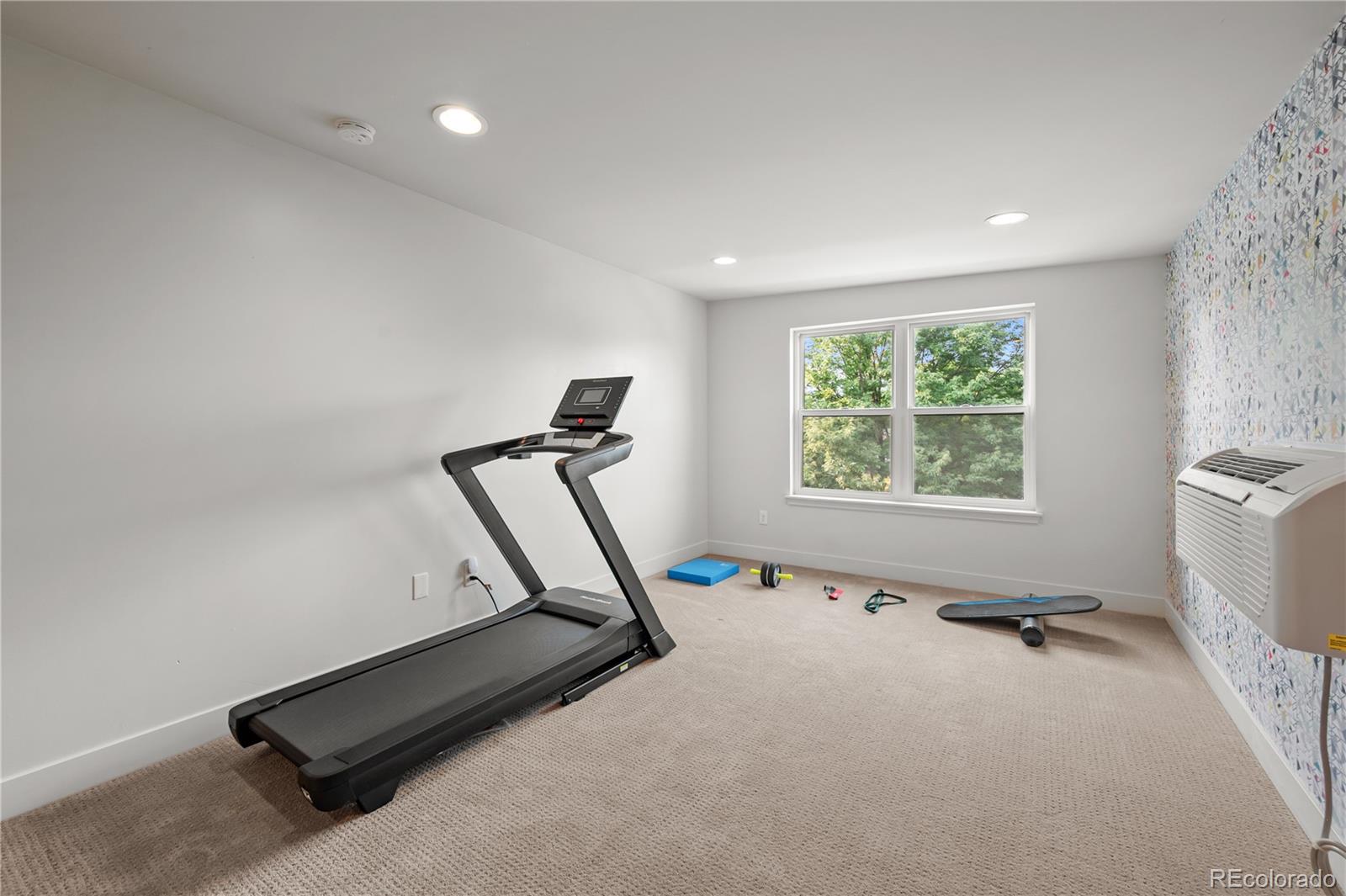 3448 West 36th Avenue Denver, CO 80211 - Photo 31 of 48 a view of a room with gym equipment