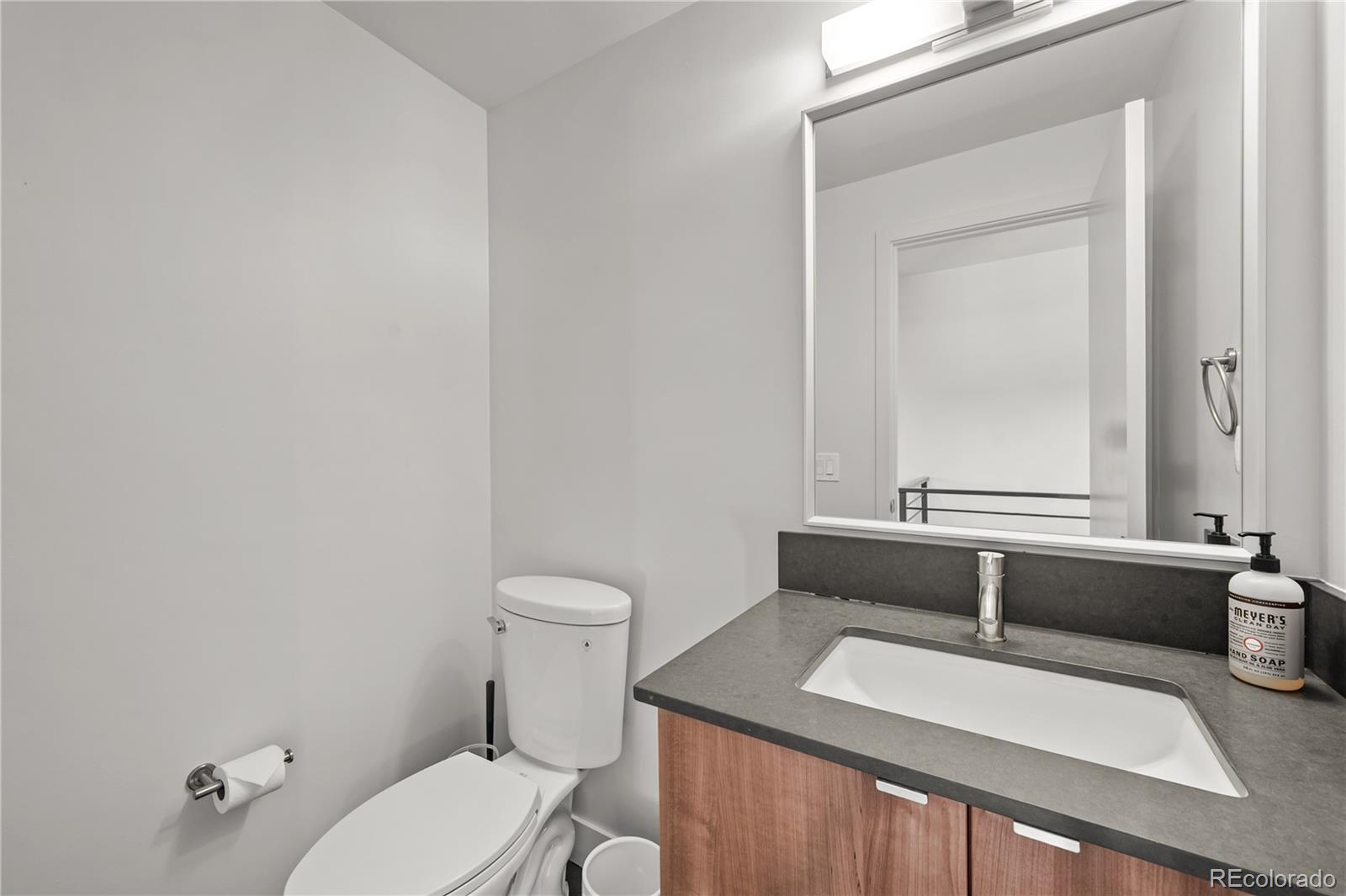 3448 West 36th Avenue Denver, CO 80211 - Photo 32 of 48 a bathroom with a sink and a toilet