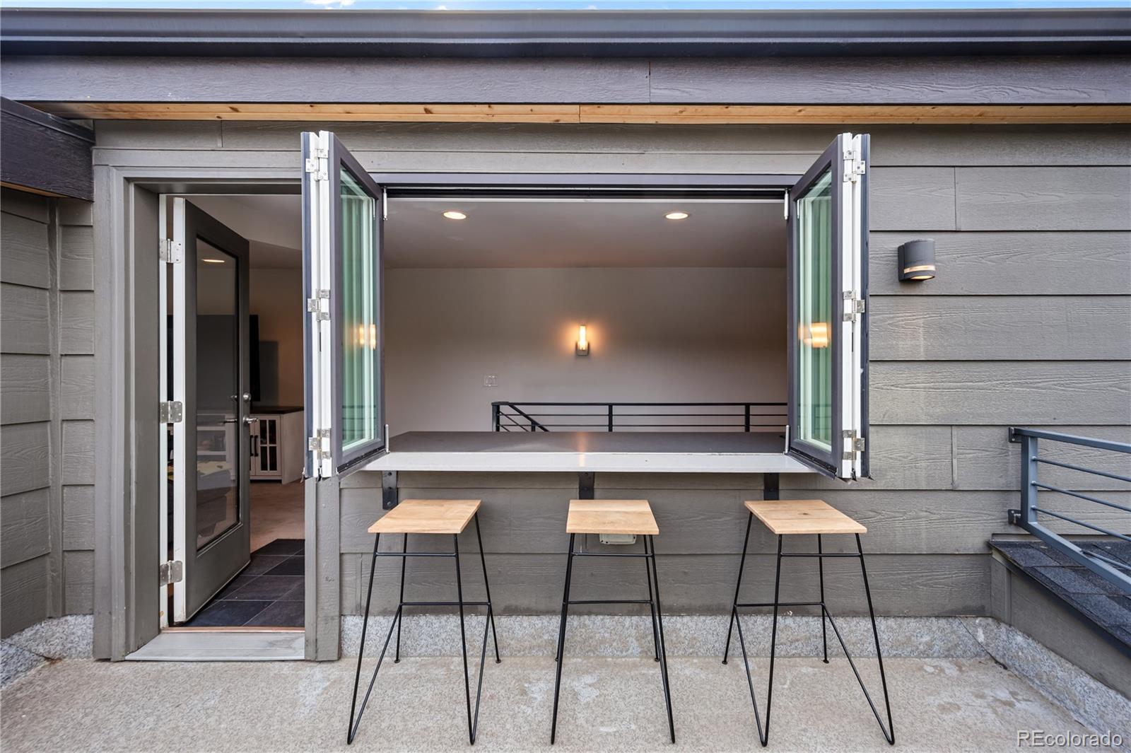 3448 West 36th Avenue Denver, CO 80211 - Photo 33 of 48 a dining table with chairs