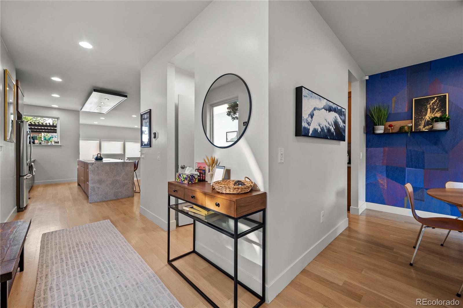 3448 West 36th Avenue Denver, CO 80211 - Photo 4 of 48 a living room with furniture and a wooden floor