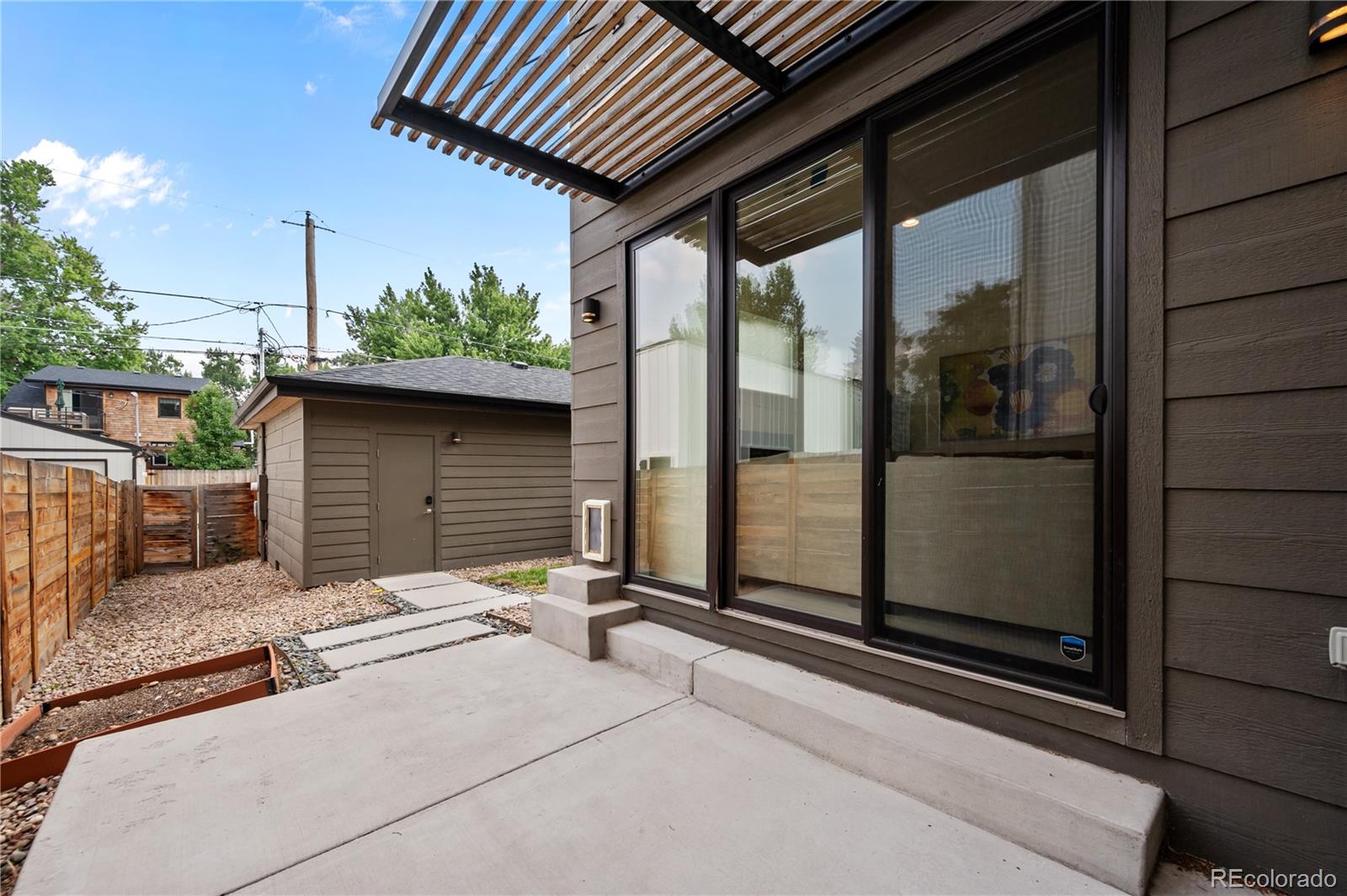 3448 West 36th Avenue Denver, CO 80211 - Photo 41 of 48 a backyard of a house with seating space