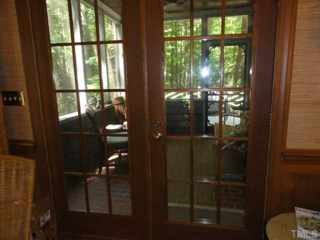 1500 Sharnbrook Court Raleigh, NC 27614 - Photo 13 of 24 French doors from the family room into the screened porch! Screened Porch