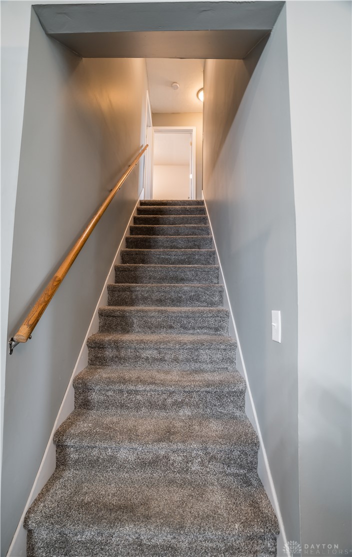 1442 Langdon Road Sidney, OH 45365 - Photo 20 of 34 This interior staircase offers a warm welcome to the upper level of the home.
