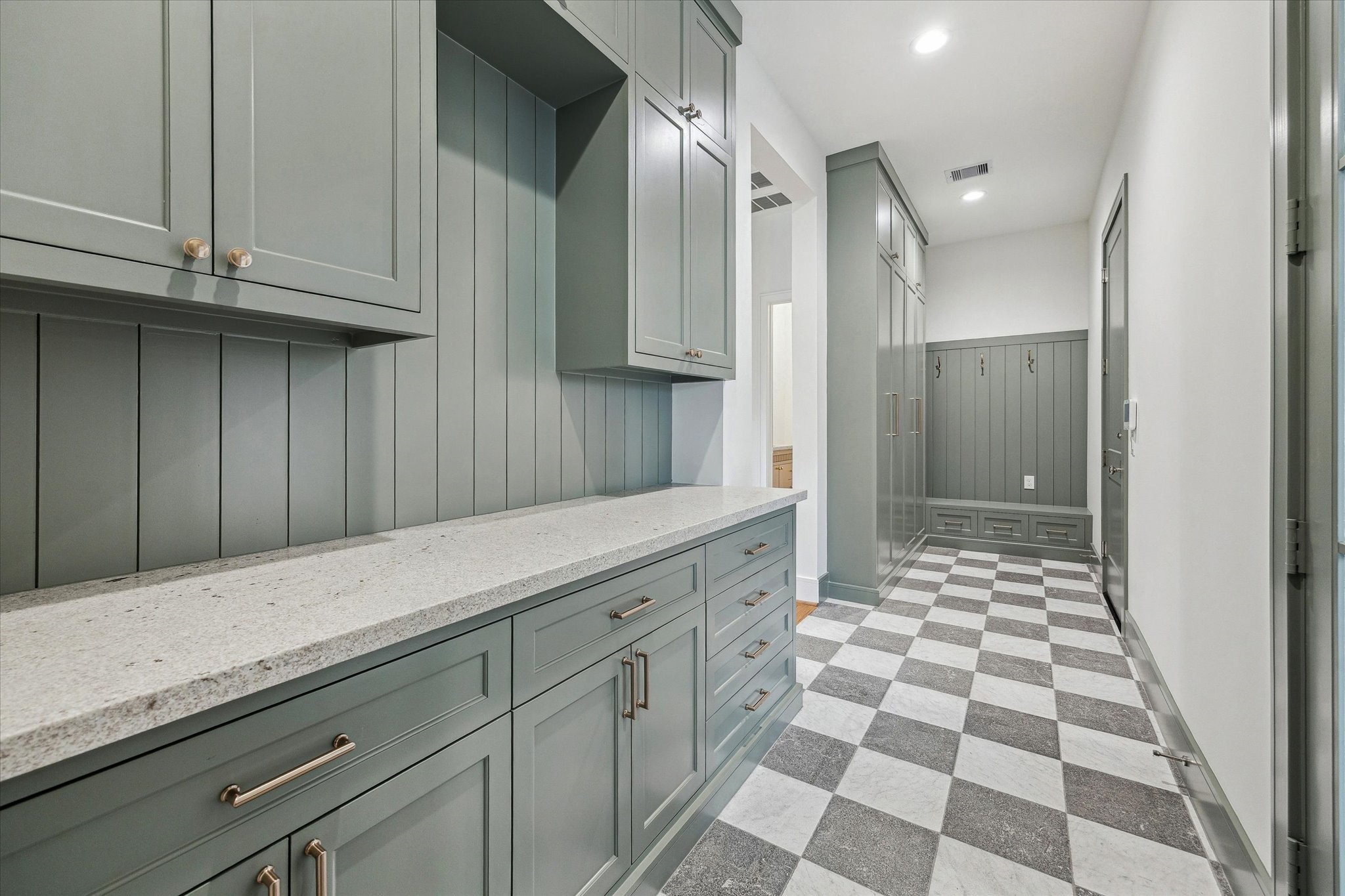 13023 Taylorcrest Road Houston, TX 77079 - Photo 19 of 49 a kitchen with granite countertop white cabinets and stainless steel appliances