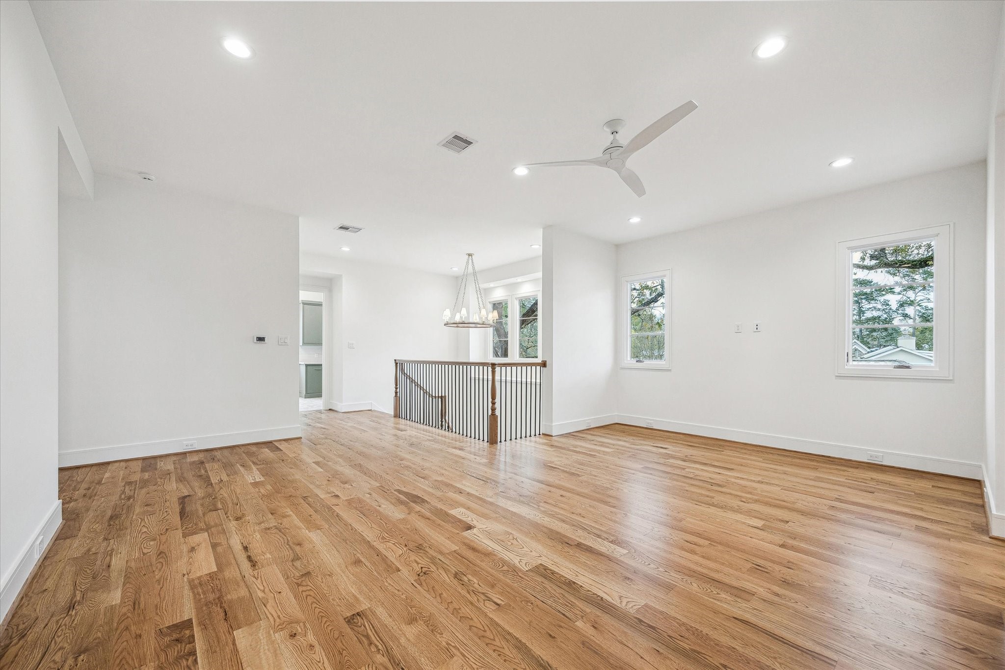 13023 Taylorcrest Road Houston, TX 77079 - Photo 25 of 49 Upstairs Game Room/Flex Space! Gorgeous hardwood flooring and adjacent to full bath and storage closet. Can be future space to convert to 6th bedroom.