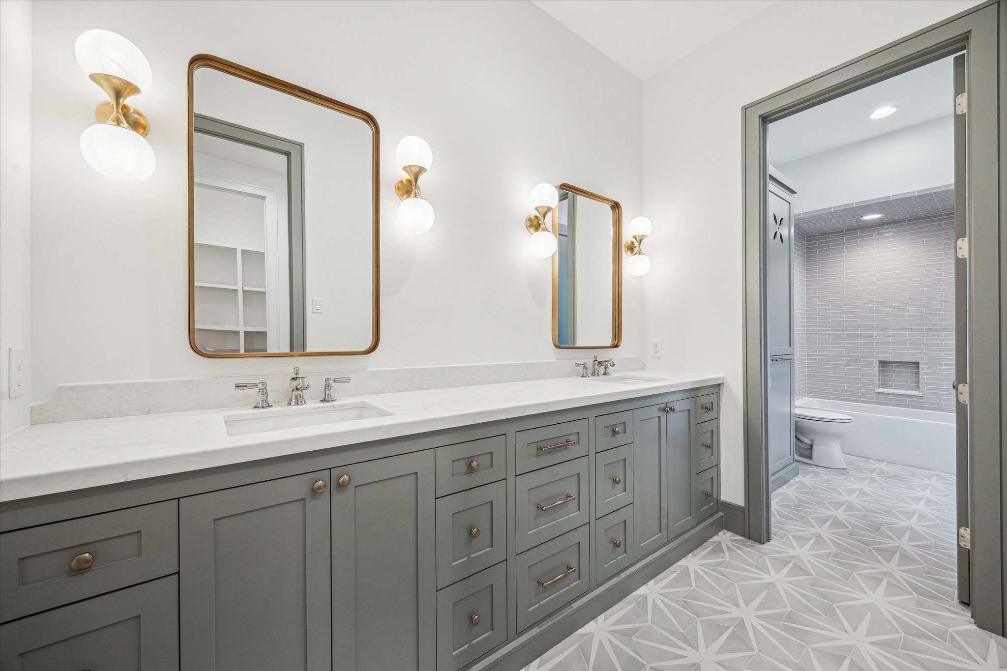 13023 Taylorcrest Road Houston, TX 77079 - Photo 28 of 49 a bathroom with a double vanity sink mirror and a