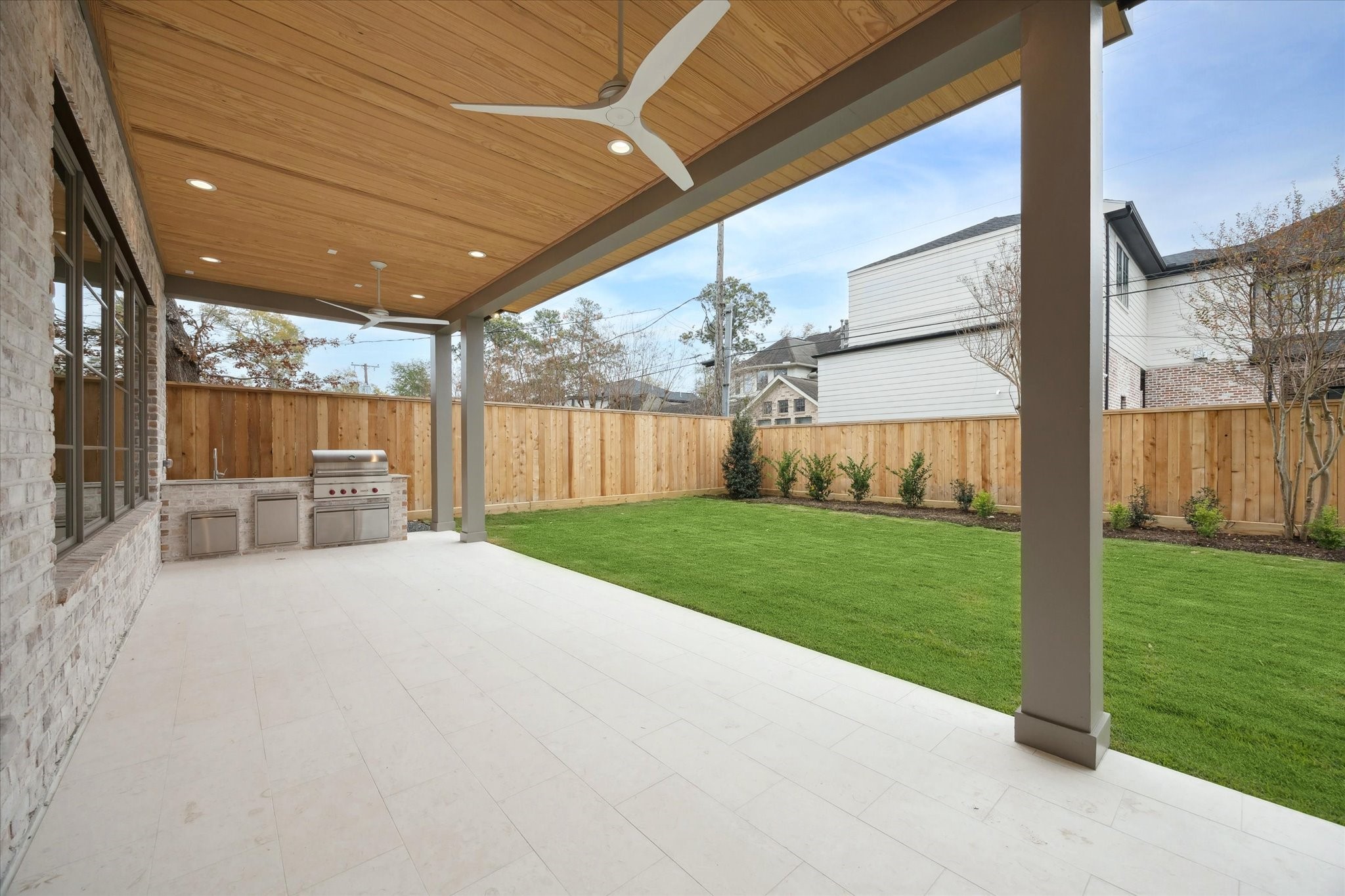 13023 Taylorcrest Road Houston, TX 77079 - Photo 46 of 49 Wonderful outdoor space for entertaining! Custom bead board ceilings, two fans, and custom limestone floors.