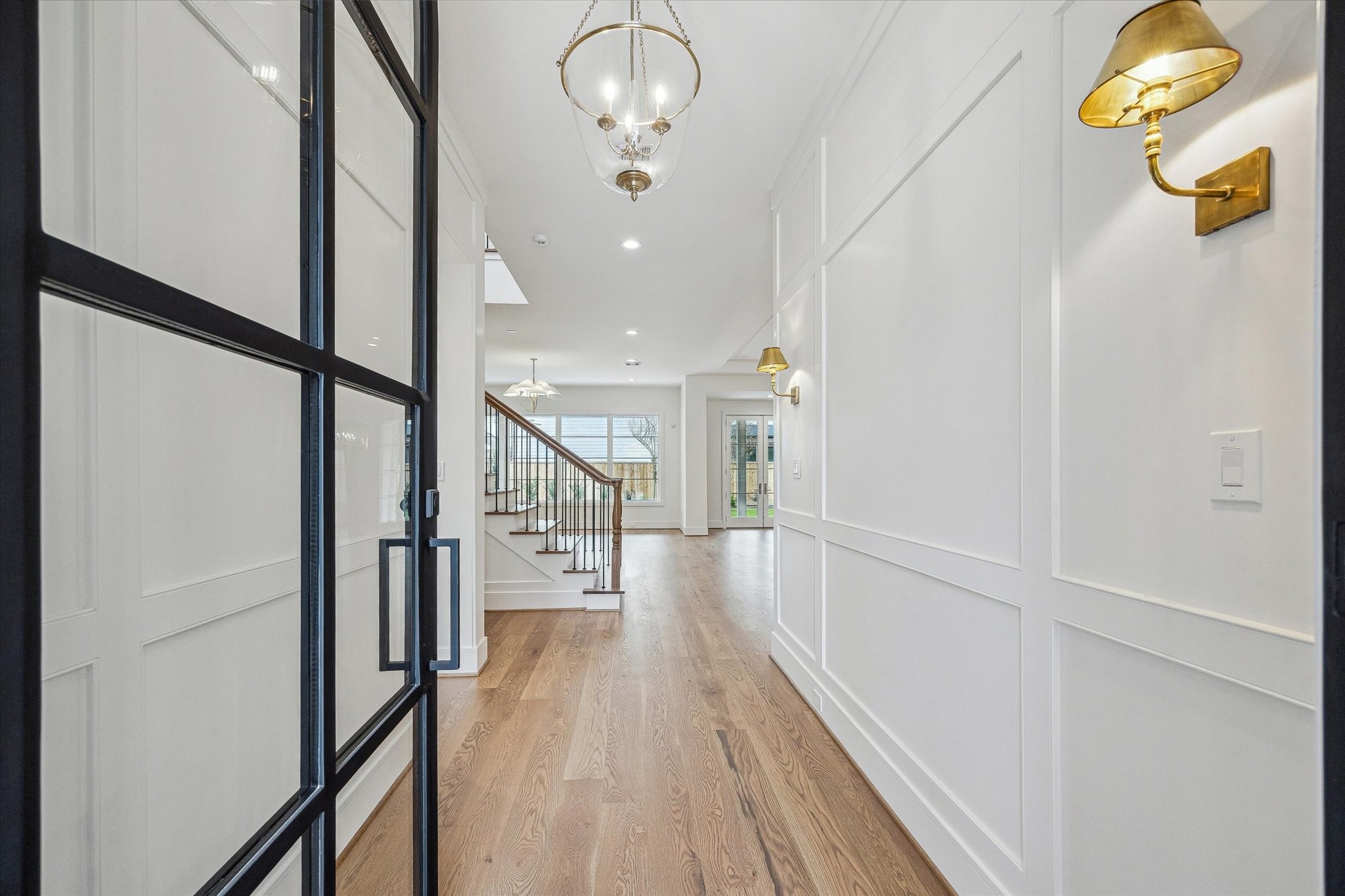 13023 Taylorcrest Road Houston, TX 77079 - Photo 48 of 49 a view of a hallway with wooden floor and staircase
