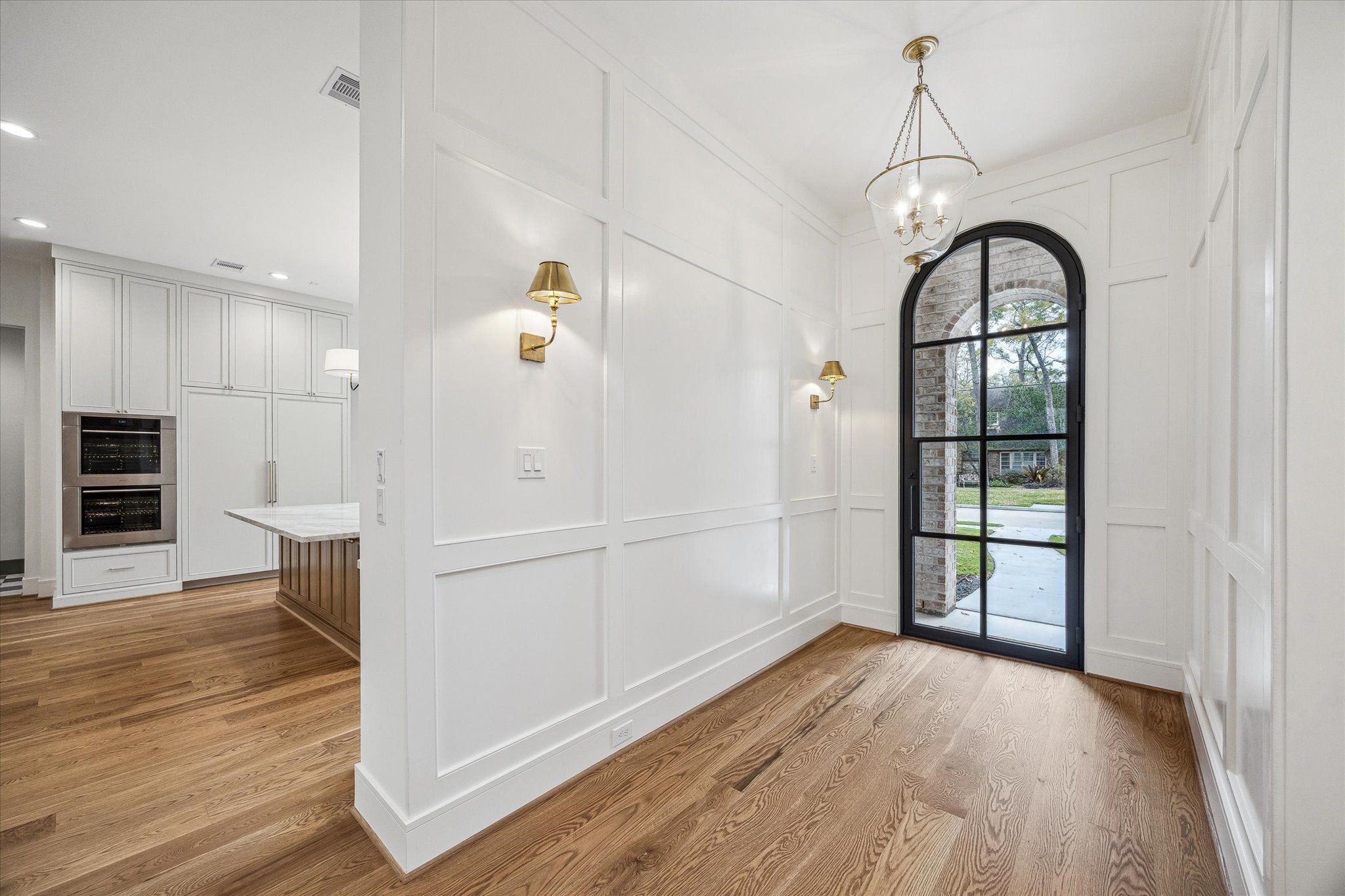 13023 Taylorcrest Road Houston, TX 77079 - Photo 5 of 49 wooden floor in an empty room with a window