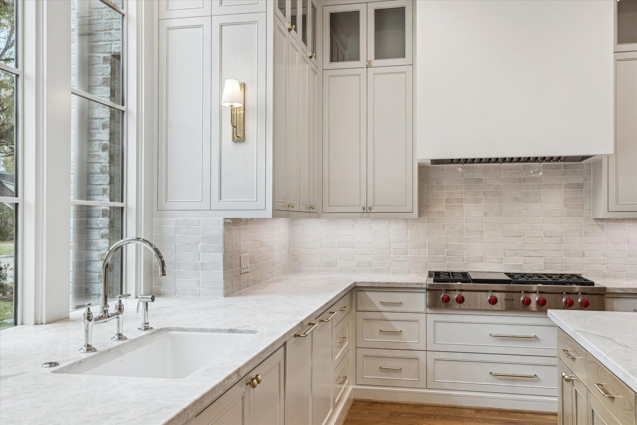13023 Taylorcrest Road Houston, TX 77079 - Photo 9 of 49 a kitchen with granite countertop a sink and a stove