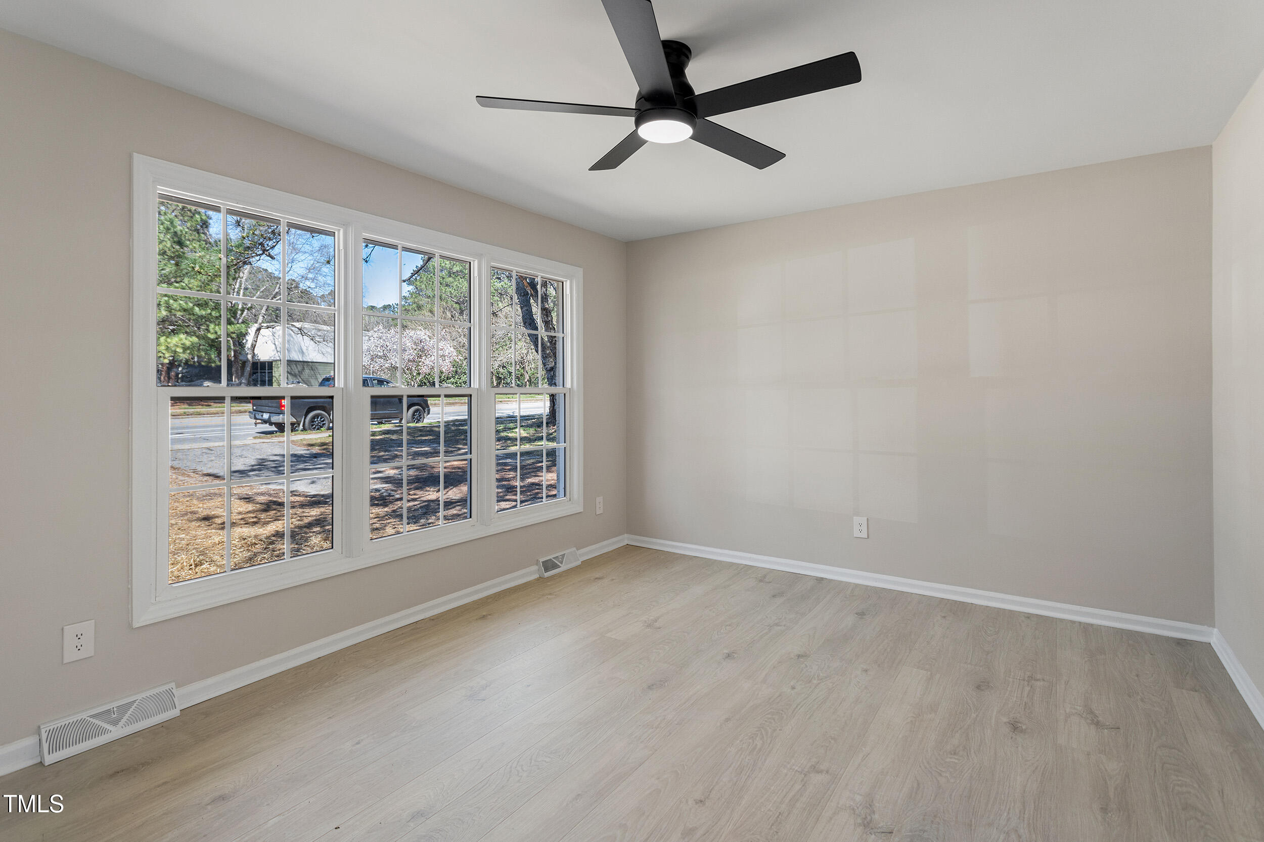 4204 Green Road Raleigh, NC 27604 - Photo 13 of 39 a view of an empty room with a window