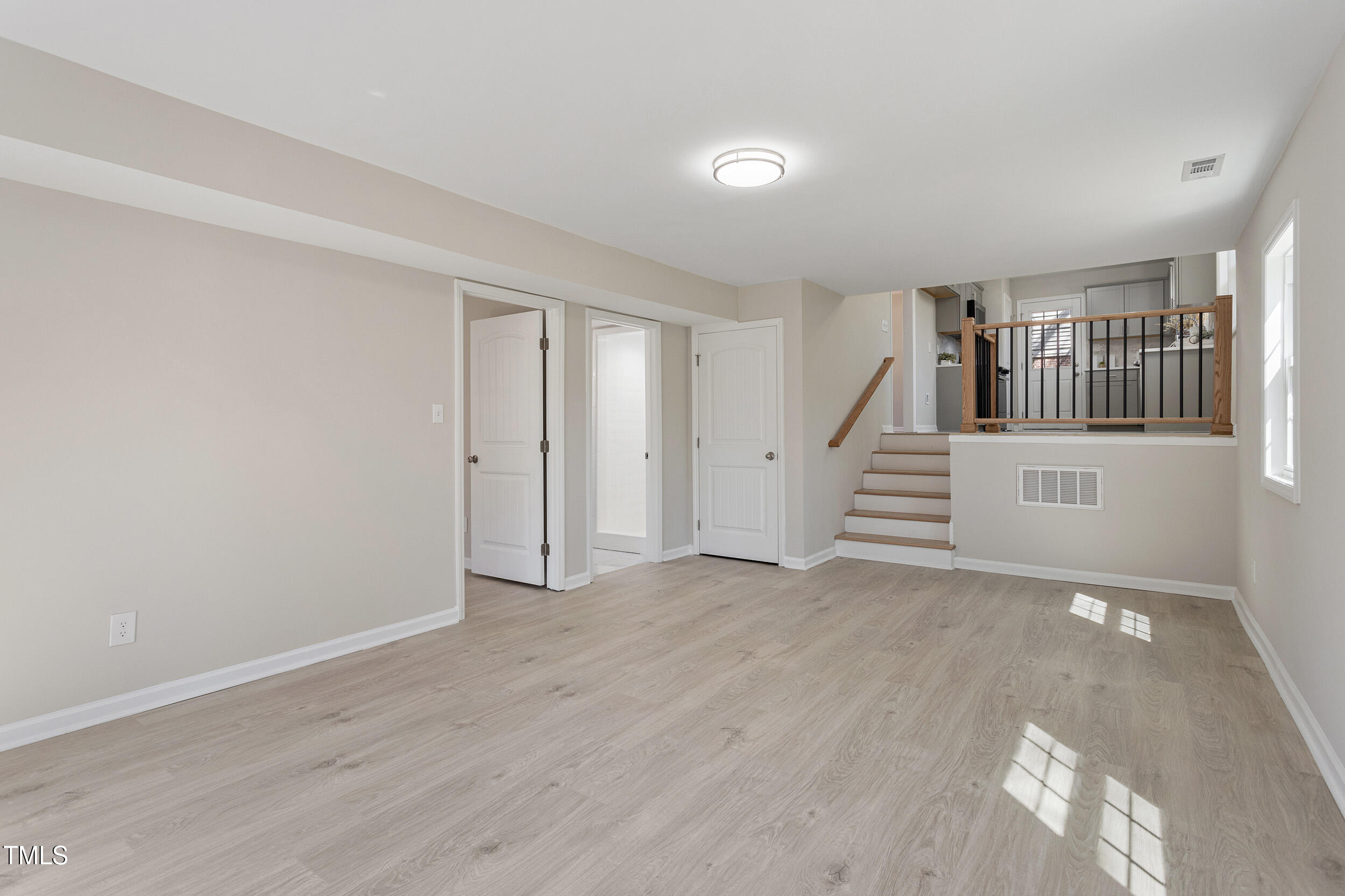 4204 Green Road Raleigh, NC 27604 - Photo 17 of 39 a view of an empty room with stairs