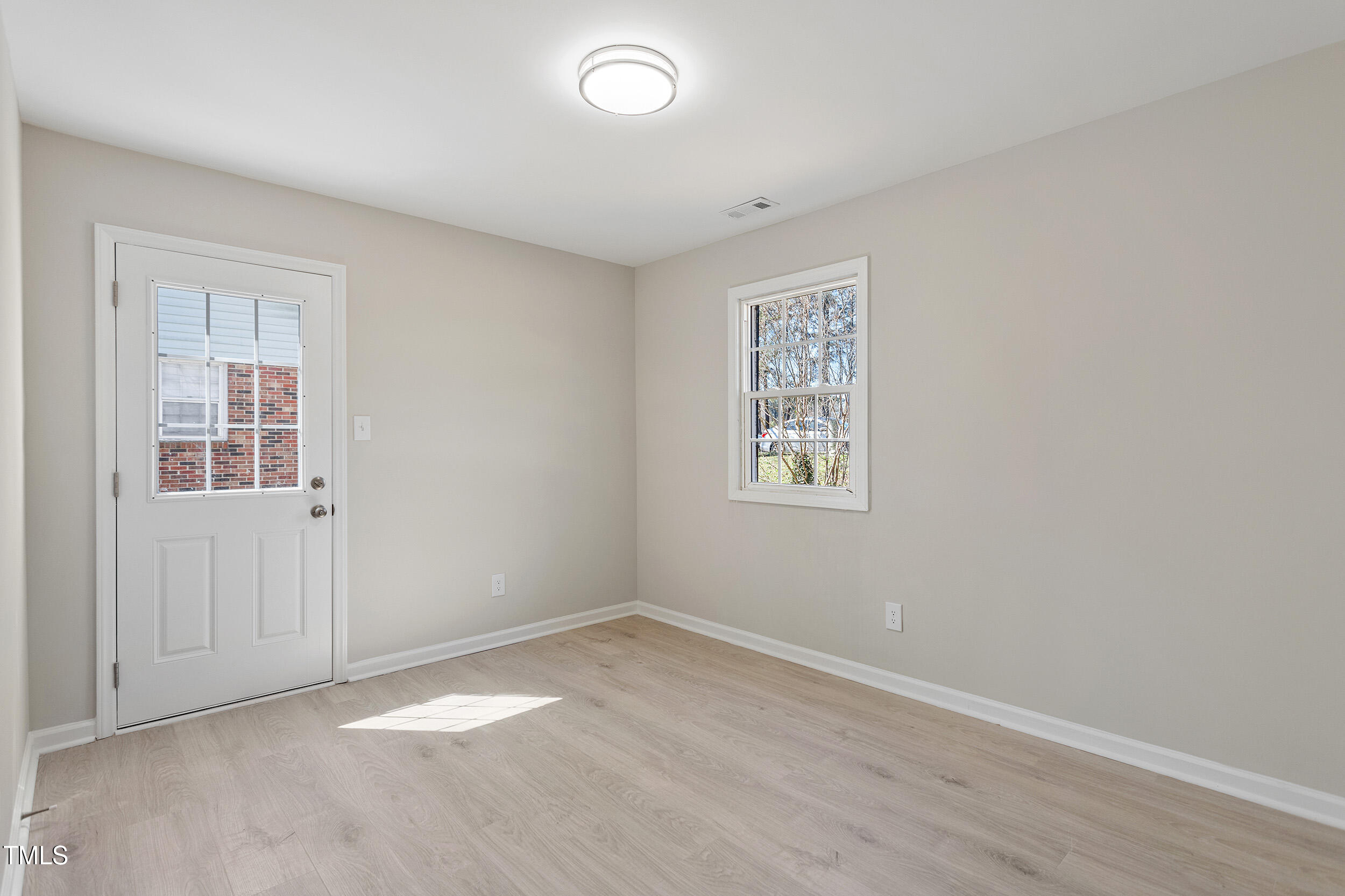 4204 Green Road Raleigh, NC 27604 - Photo 23 of 39 an empty room with windows