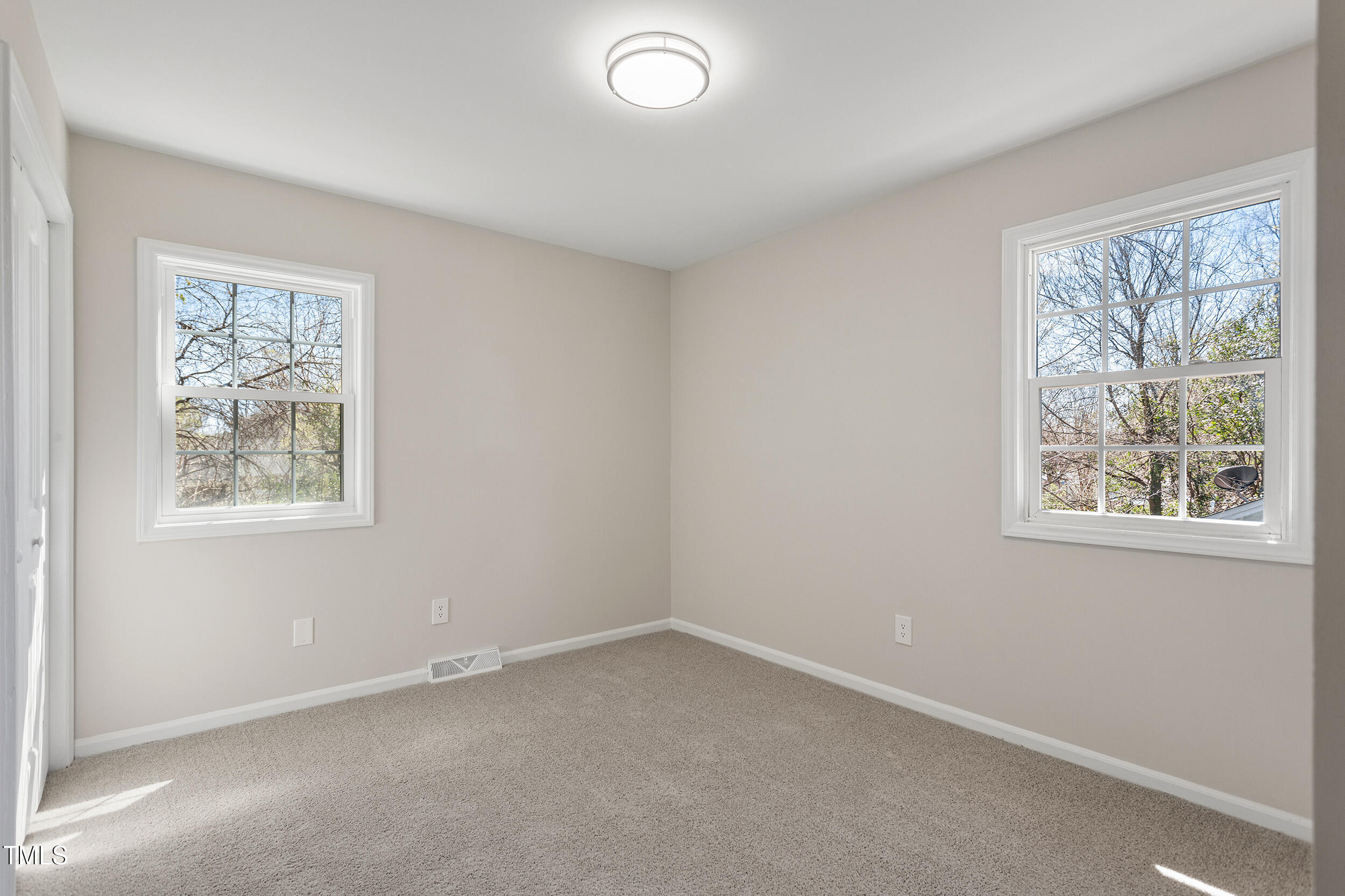 4204 Green Road Raleigh, NC 27604 - Photo 26 of 39 an empty room with a window