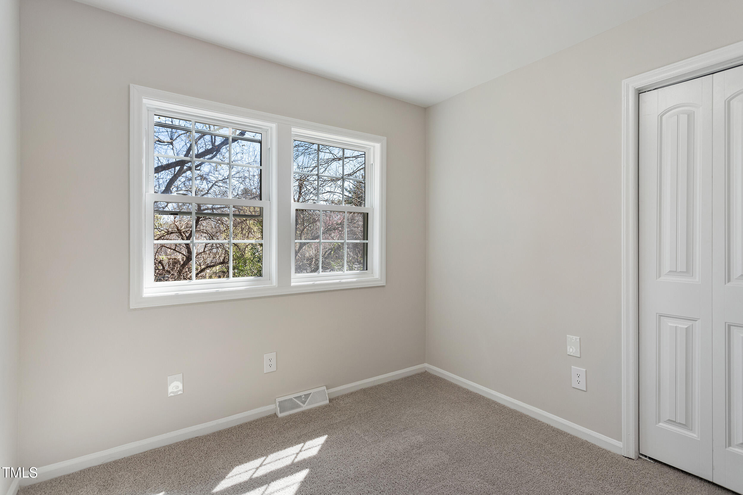 4204 Green Road Raleigh, NC 27604 - Photo 28 of 39 an empty room with windows