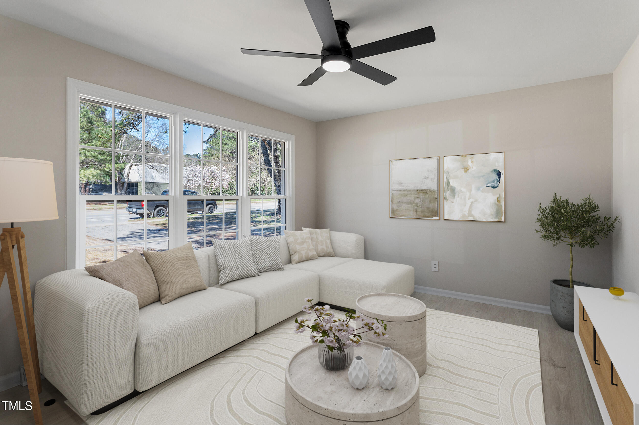 4204 Green Road Raleigh, NC 27604 - Photo 6 of 39 a living room with furniture and a large window