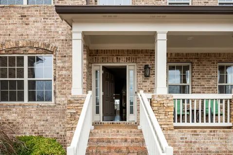 a bench sitting in front of a building
