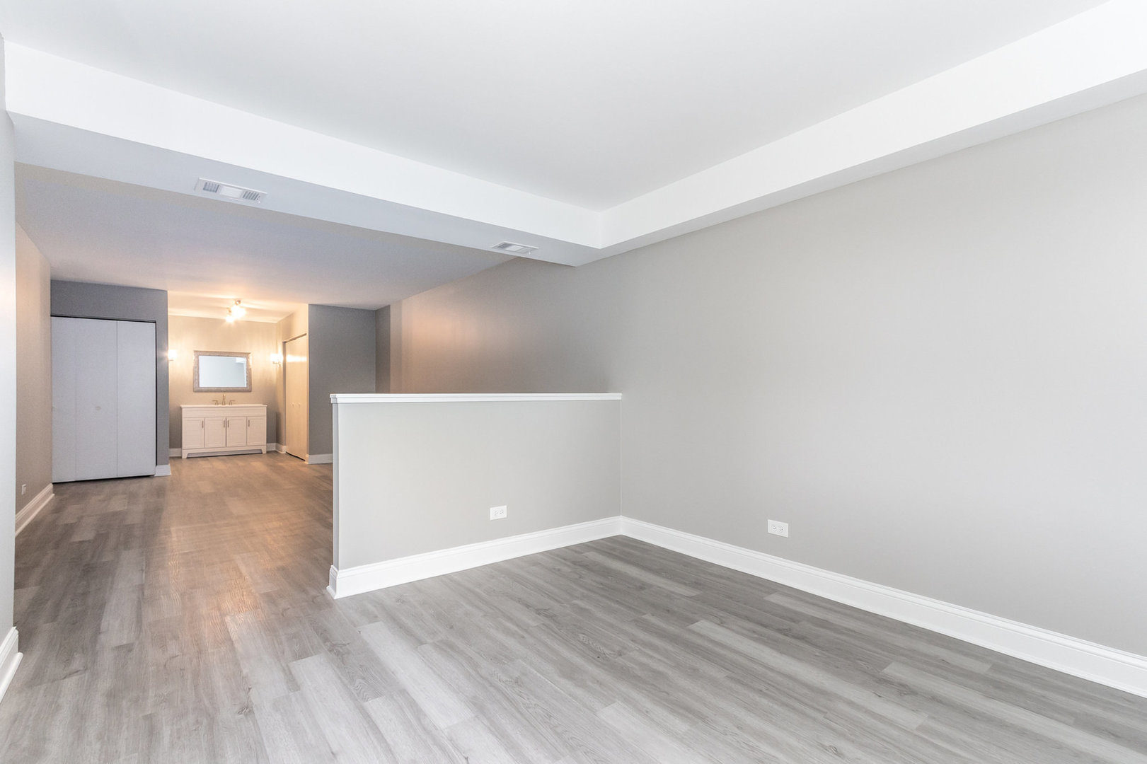 470 Raintree Court, Unit 2H Glen Ellyn, IL 60137 - Photo 14 of 22 wooden floor in an empty room