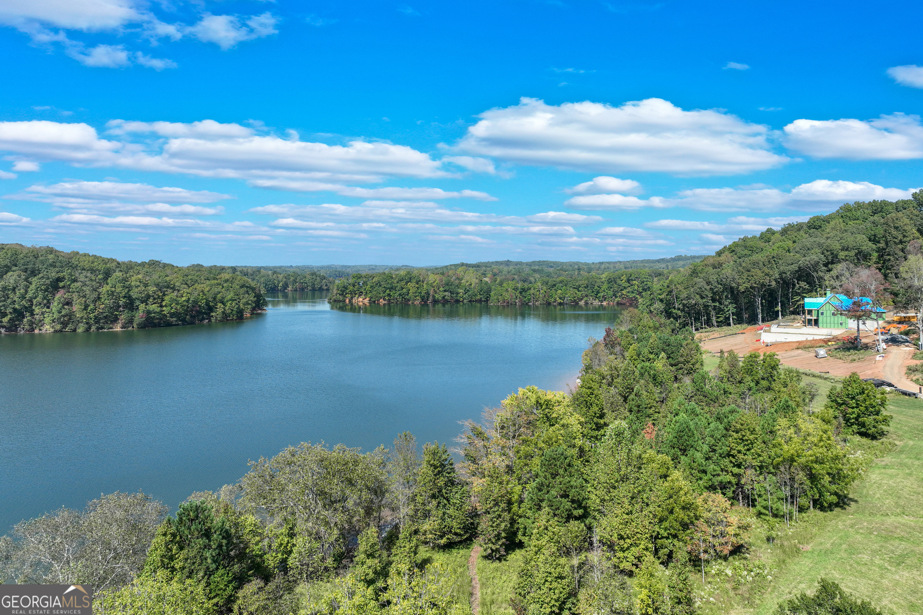 4638 Shirley Road, Unit LOT 2 Gainesville, GA 30506 - Photo 12 of 22 a view of a lake with a house