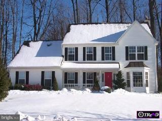 4237 Enders Way Doylestown, PA 18902 - Photo 1 of 1 a front view of a house with a yard covered in snow