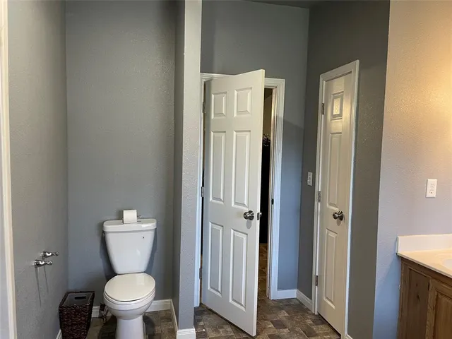 a bathroom with a toilet