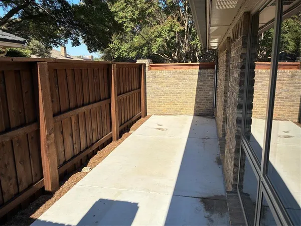 a balcony with wooden floor