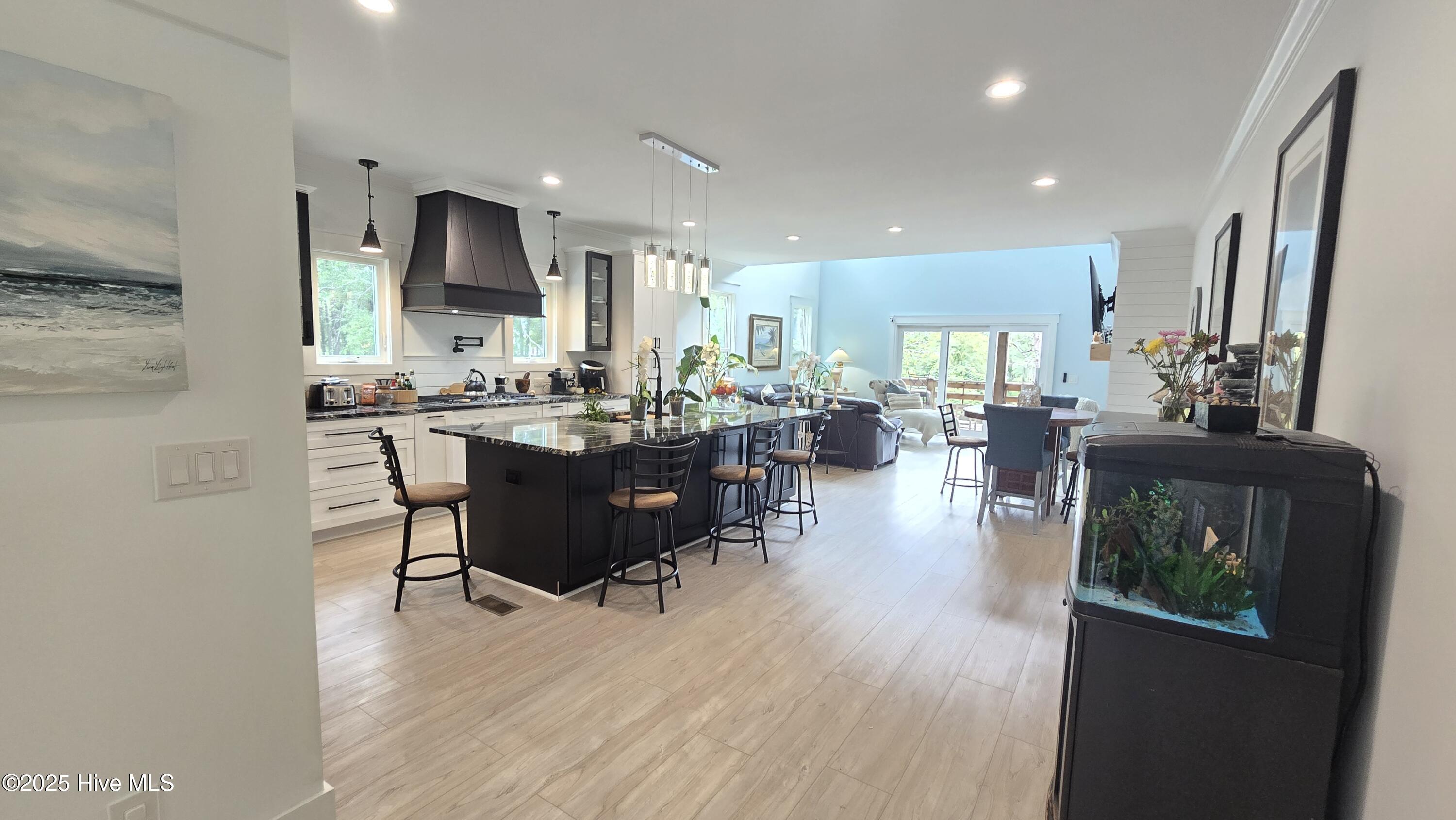 2659 Seashore Road Southwest Supply, NC 28462 - Photo 19 of 75 OPEN KITCHEN AND DINING PERFECT FOR LARGE GATHERINGS