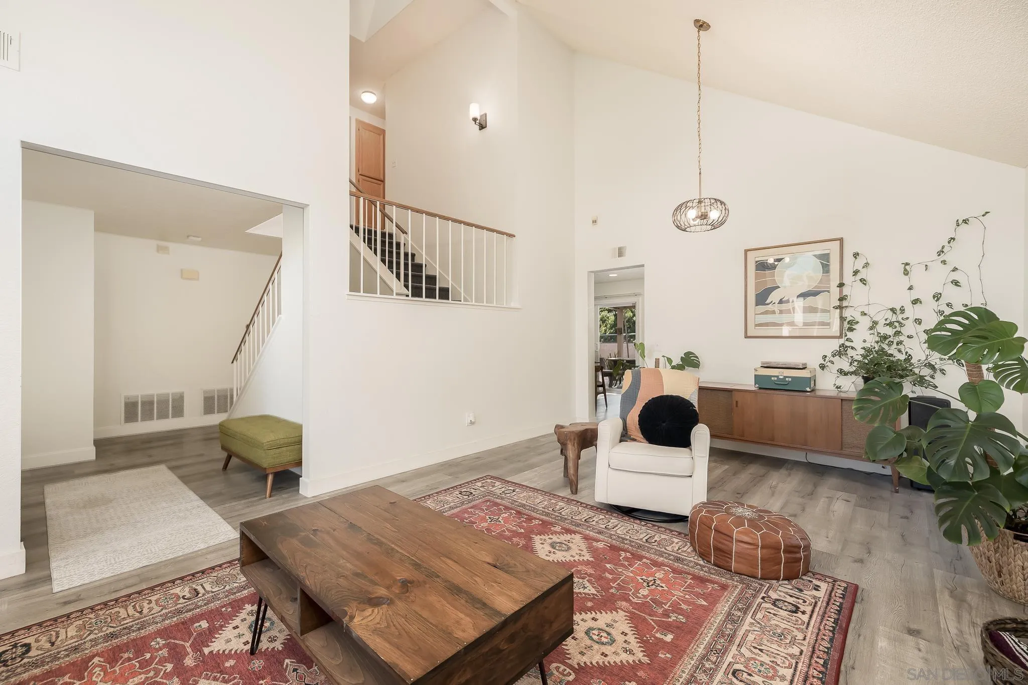 1678 Whitestone Road Spring Valley, CA 91977 - Photo 13 of 43 a living room with furniture and wooden floor