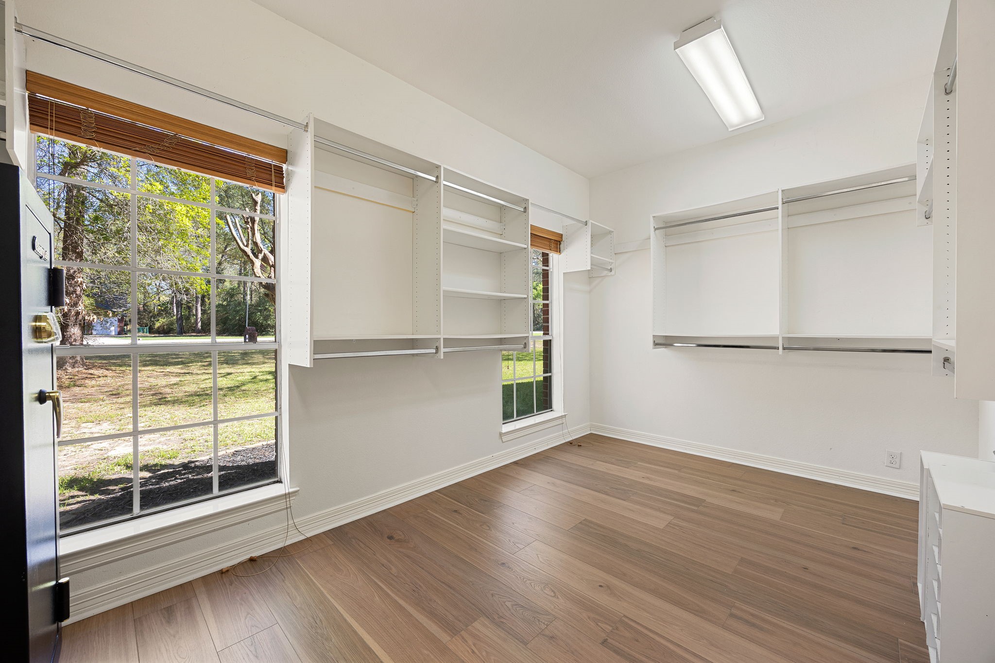 14419 Timbergreen Drive Magnolia, TX 77355 - Photo 17 of 43 Huge walk-in closet with built-in shelves, large windows, and plenty of space to keep everything organized.