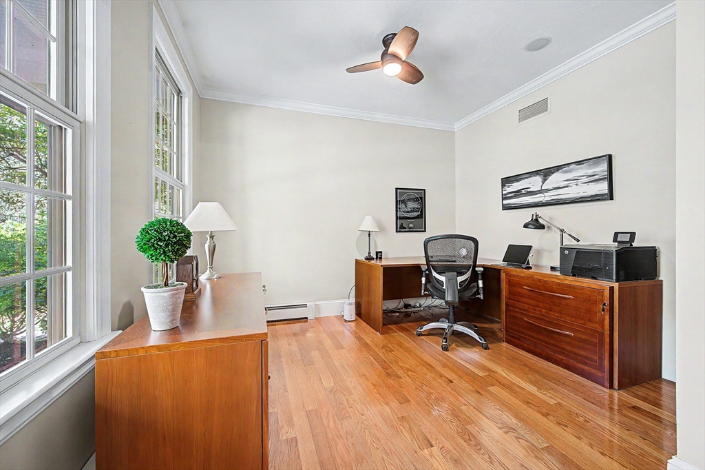270 Mendon Road Sutton, MA 01590 - Photo 17 of 42 a living room with furniture and a potted plant
