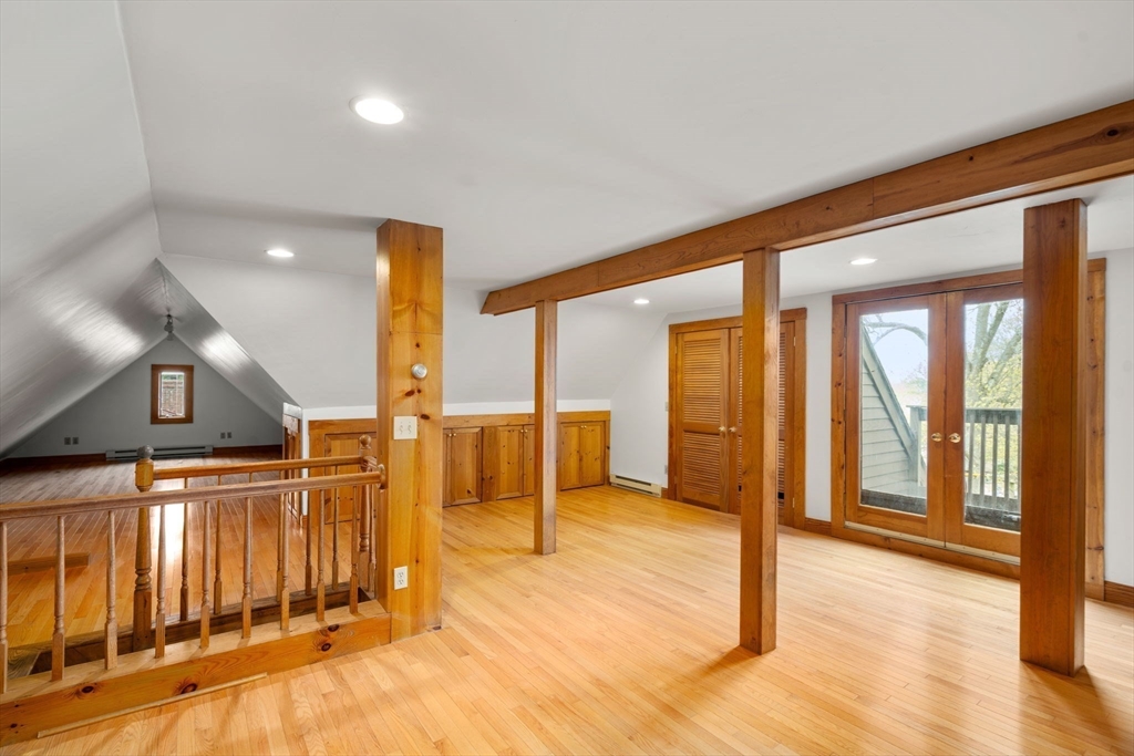 110 Wallis Road Chestnut Hill, MA 02467 - Photo 20 of 29 a view of a hallway with wooden floor and furniture
