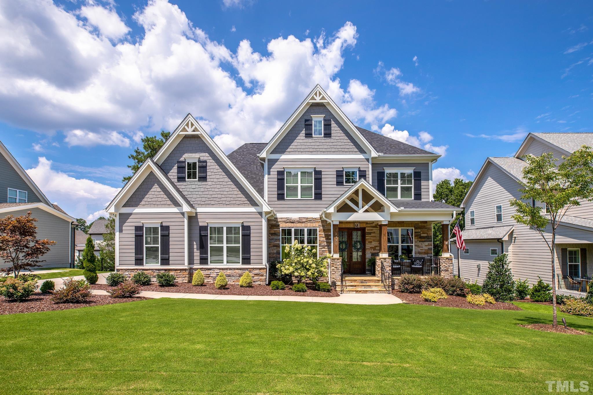 1420 Margrave Drive Wake Forest, NC 27587 - Photo 1 of 30 a front view of a house with a garden