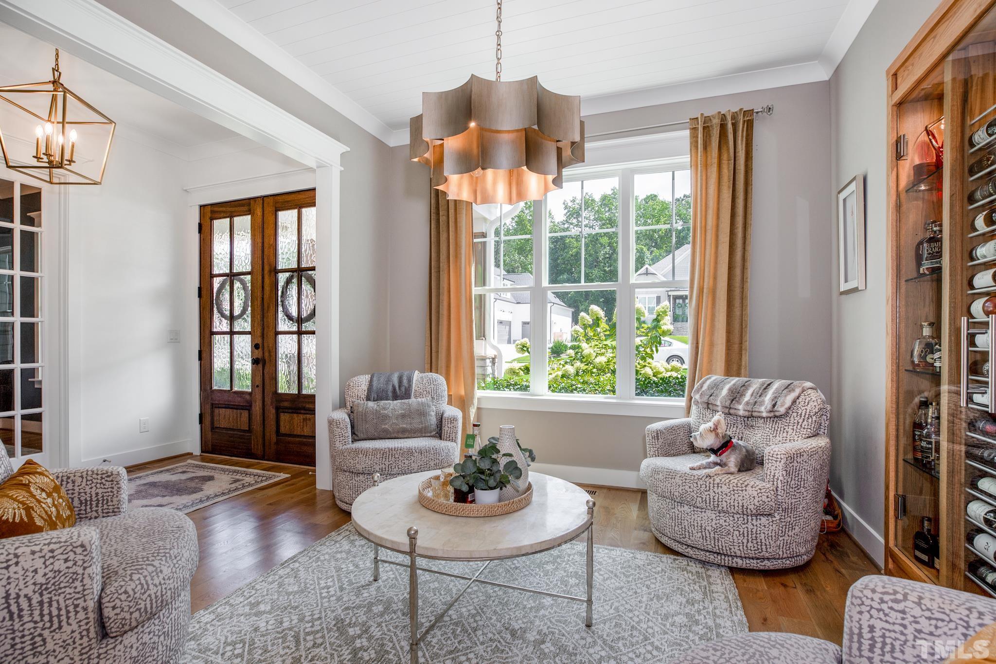 1420 Margrave Drive Wake Forest, NC 27587 - Photo 11 of 30 a living room with furniture and a large window