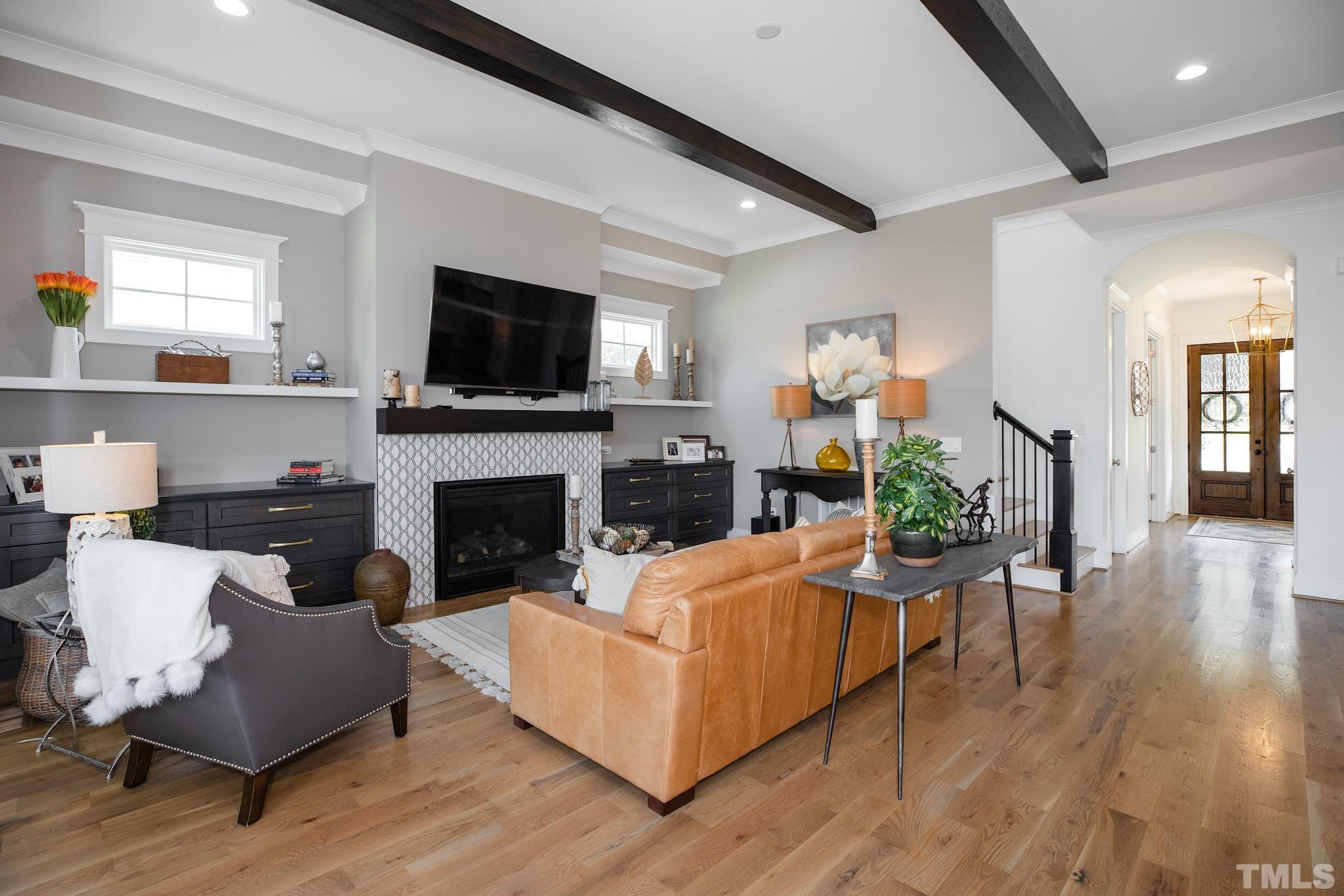 1420 Margrave Drive Wake Forest, NC 27587 - Photo 14 of 30 a living room with furniture fireplace and flat screen tv