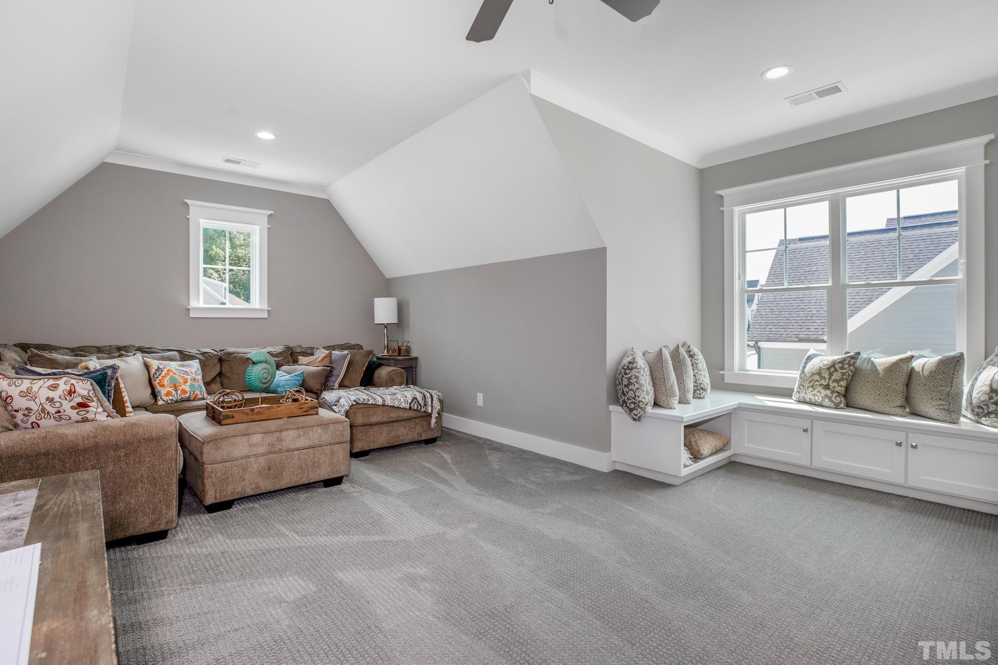 1420 Margrave Drive Wake Forest, NC 27587 - Photo 26 of 30 a living room with furniture and a large window