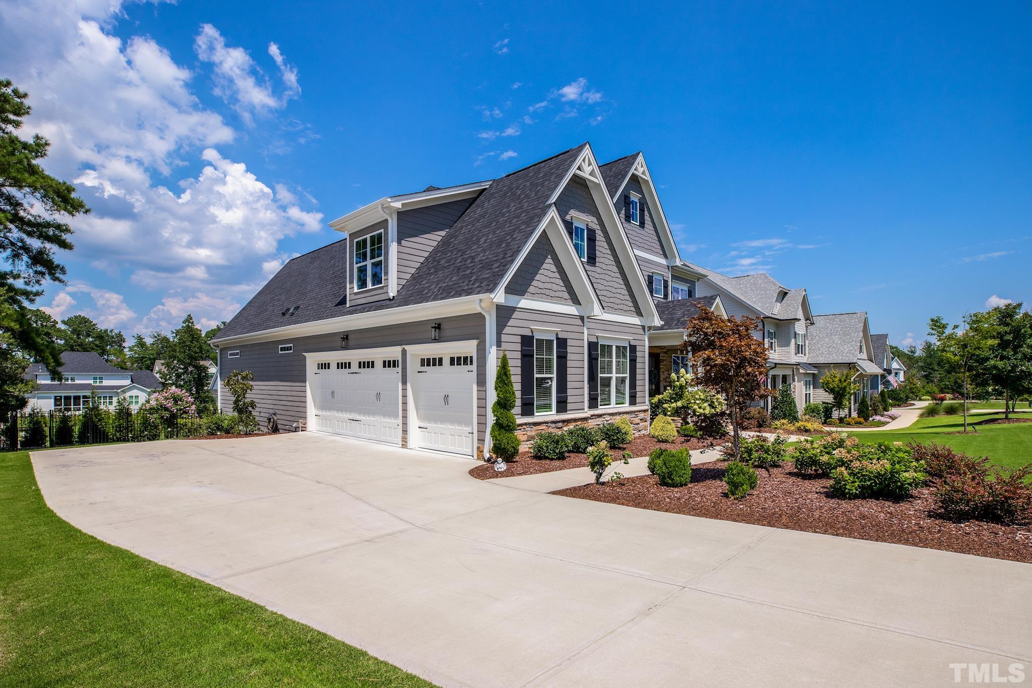 1420 Margrave Drive Wake Forest, NC 27587 - Photo 30 of 30 a front view of a house with garden