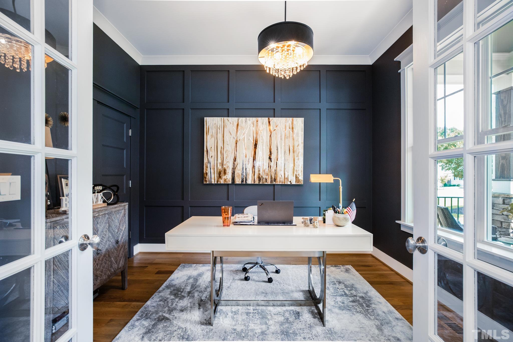 1420 Margrave Drive Wake Forest, NC 27587 - Photo 8 of 30 a view of a dining room with furniture window and wooden floor
